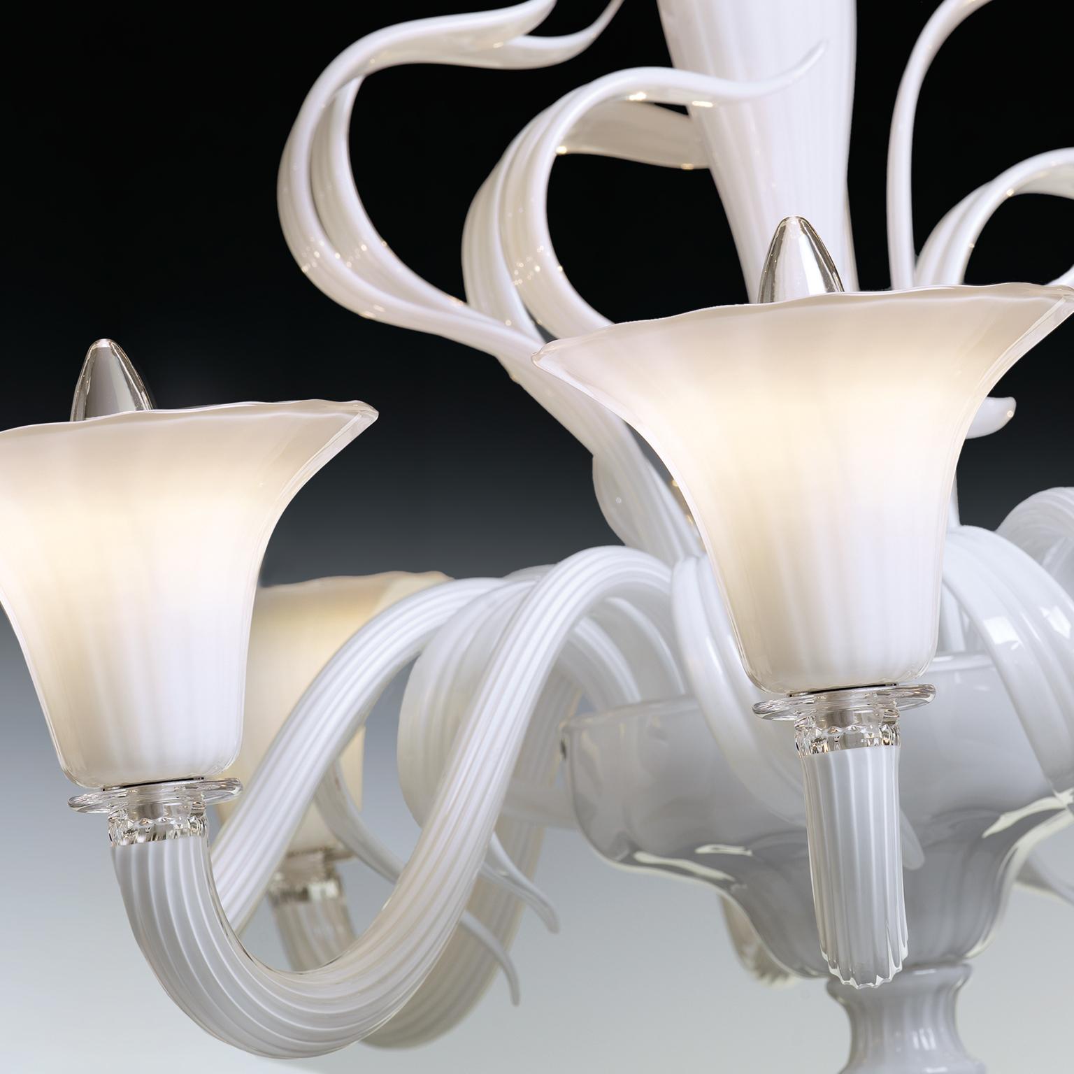 Vento Murano glass chandelier by Seguso Vetri d'Arte. Handmade, blown Murano glass chandelier with two dramatic tiers and 18 lights in an opaque white glass color and unique LED bulbs. Takes eighteen E 12 / 14 or LED light bulbs depending on the
