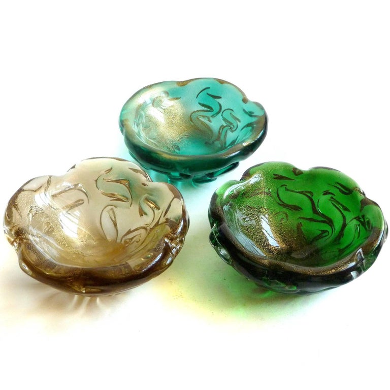 Priced Per Item (3 colors available). Beautiful Murano hand blown champagne, green and forest green Italian art glass flower shaped bowls with gold flecks. Attributed to the Seguso Vetri d'Arte company. The three pieces have a sculptural design,