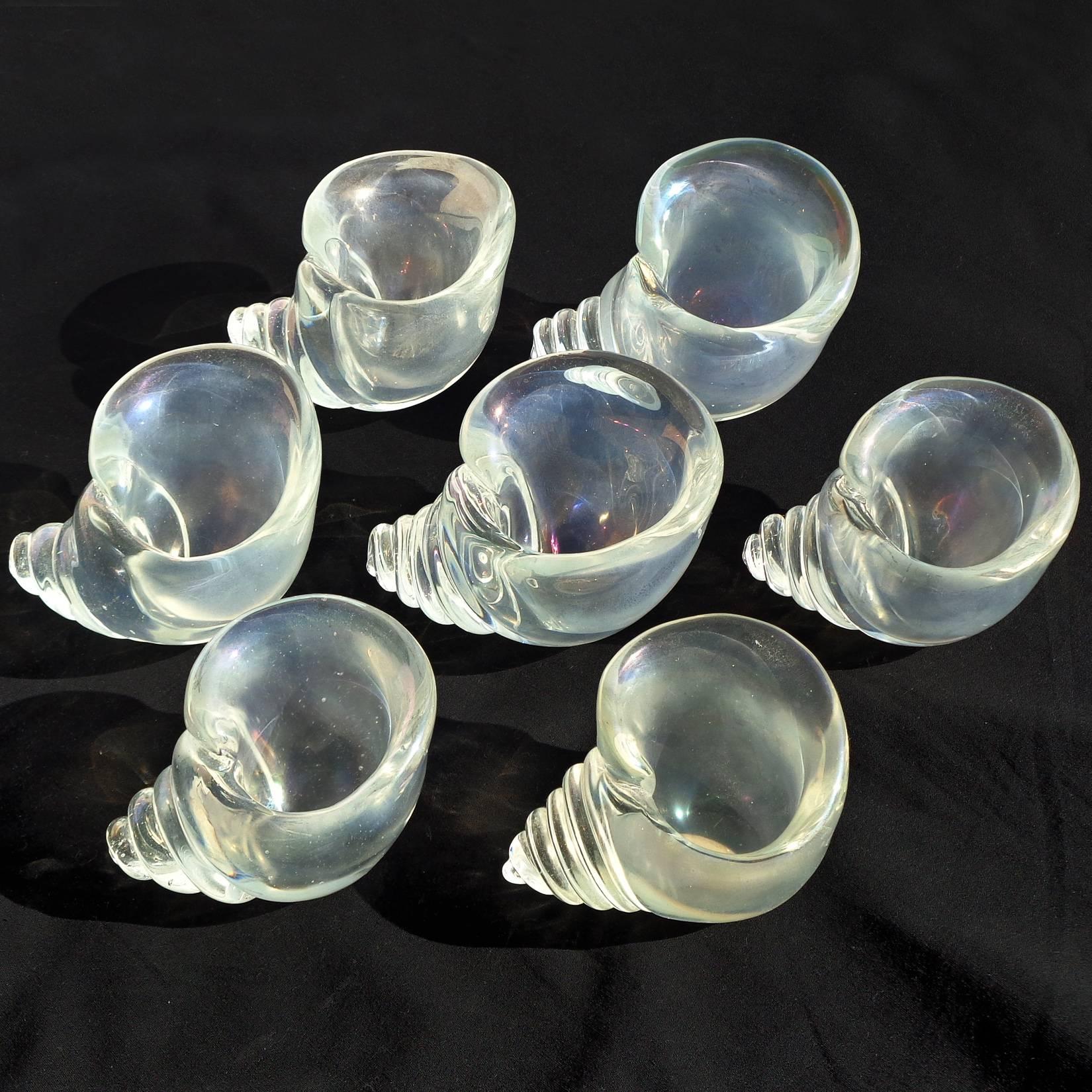 Please note, priced per item (7 available), beautiful vintage Murano hand blown iridescent art glass seashells. Documented to designer Flavio Poli for the Seguso Vetri d'Arte company. Measurements, shapes and amount of iridescence varies on each
