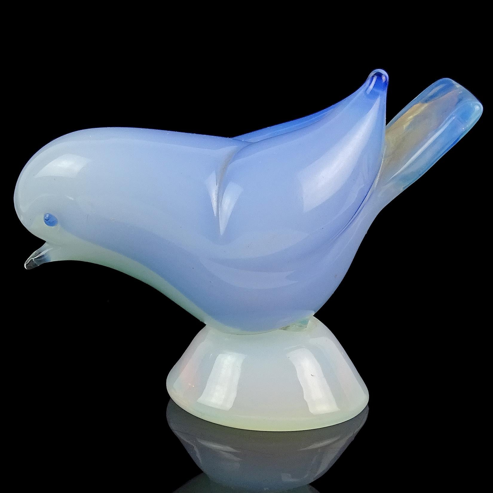 Beautiful vintage Murano hand blown, opalescent white, blue and a hint of aqua Italian art glass bird figurine / sculpture. Documented to the Seguso Vetri d'Arte company, with original label still attached. The label reads 