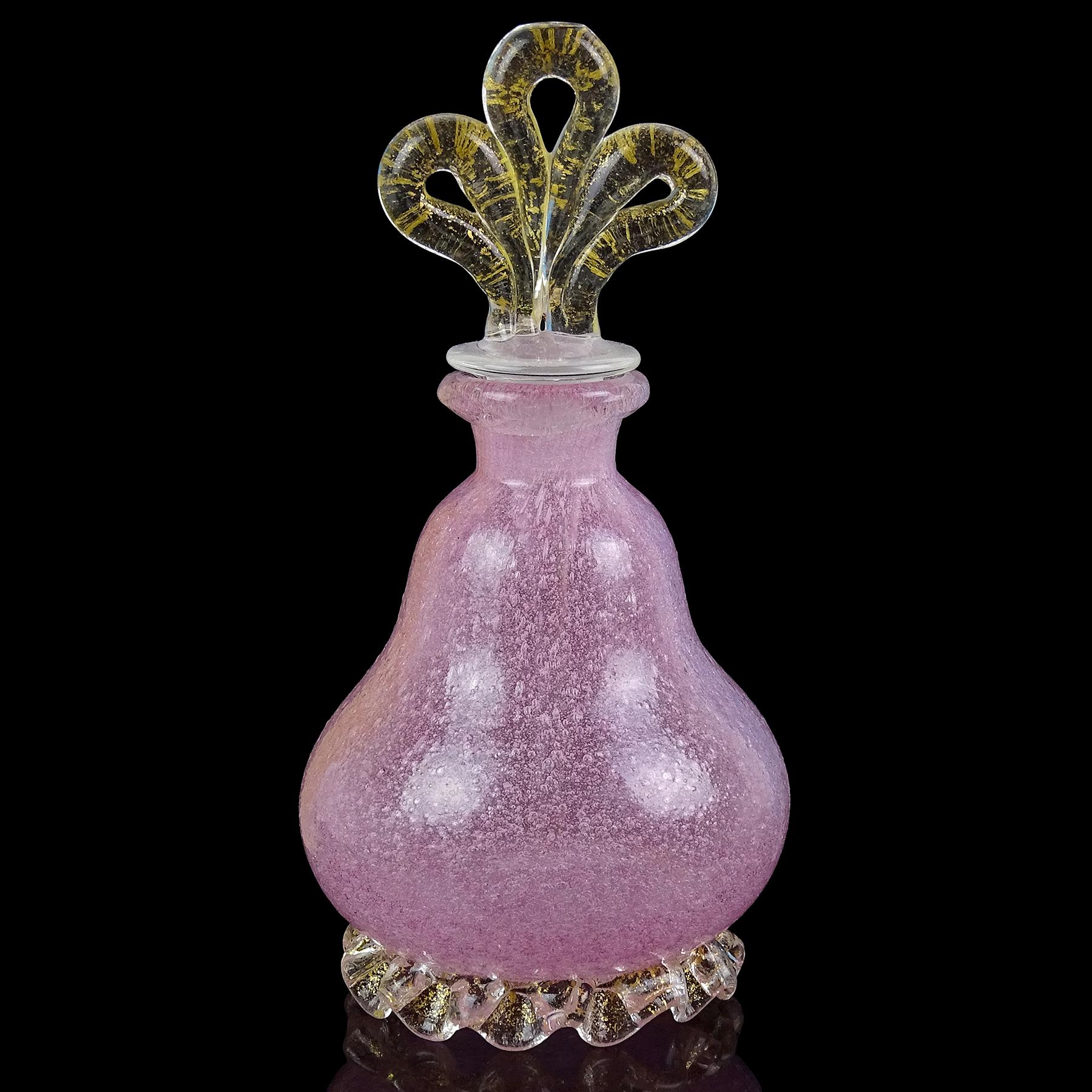 Beautiful and rare, vintage Murano hand blown pink and gold flecks Italian art glass perfume bottle. Documented to the Seguso Vetri d'Arte company, circa  1946-1955. The model number is #8081, and it is published in the company's archives (see last