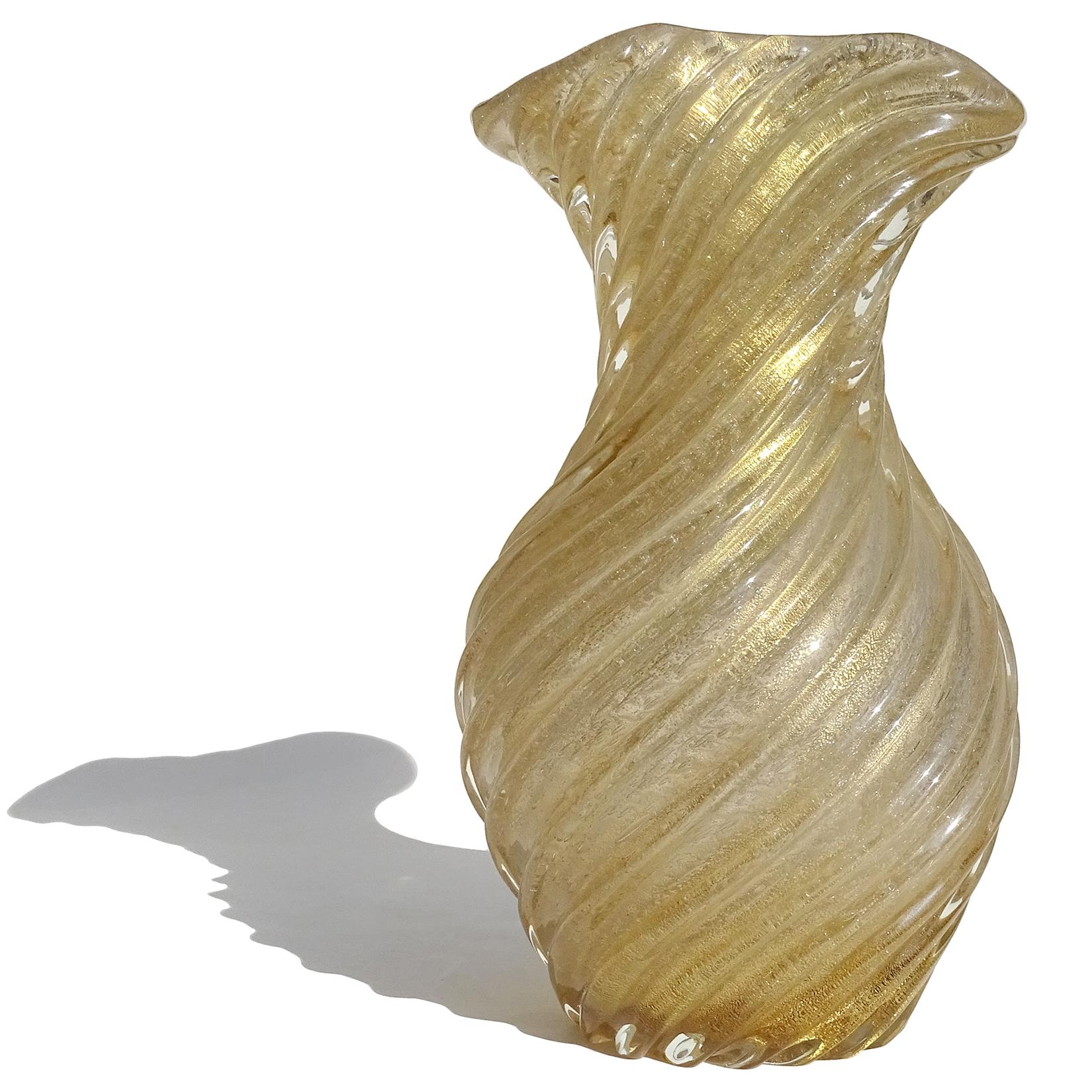 Beautiful and elegant, antique Murano hand blown champagne color and gold flecks Italian art glass flower vase. Documented to the Seguso Vetri d'Arte company, circa 1930s. Published. The vase has a fan shaped rim, and a ribbed body. Created in the