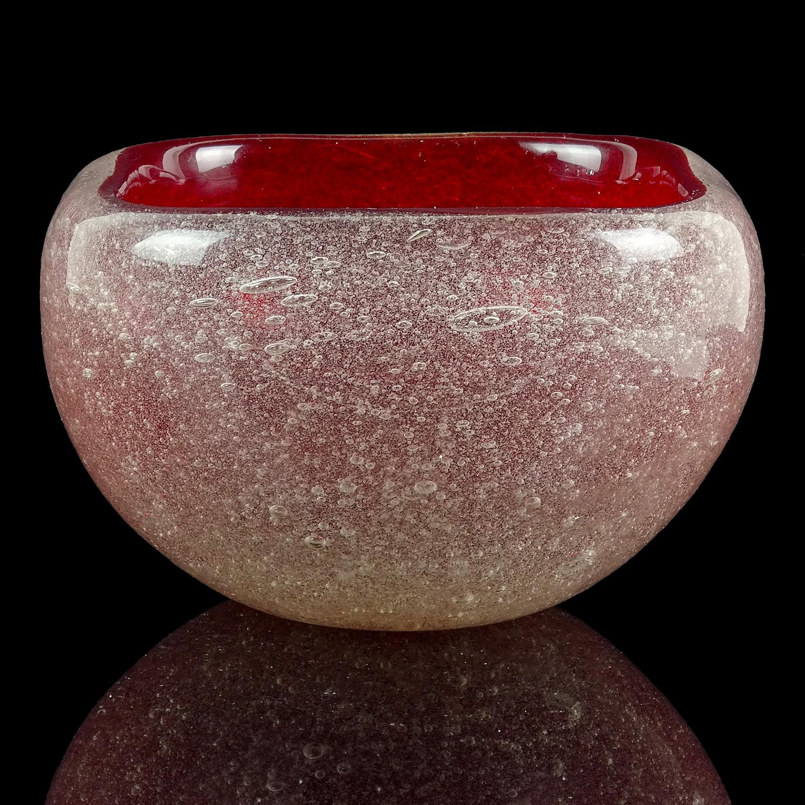 Beautiful Murano hand blown red, with bubble layer Italian art glass bowl. Documented to the Seguso Vetri D' Arte company, in the 