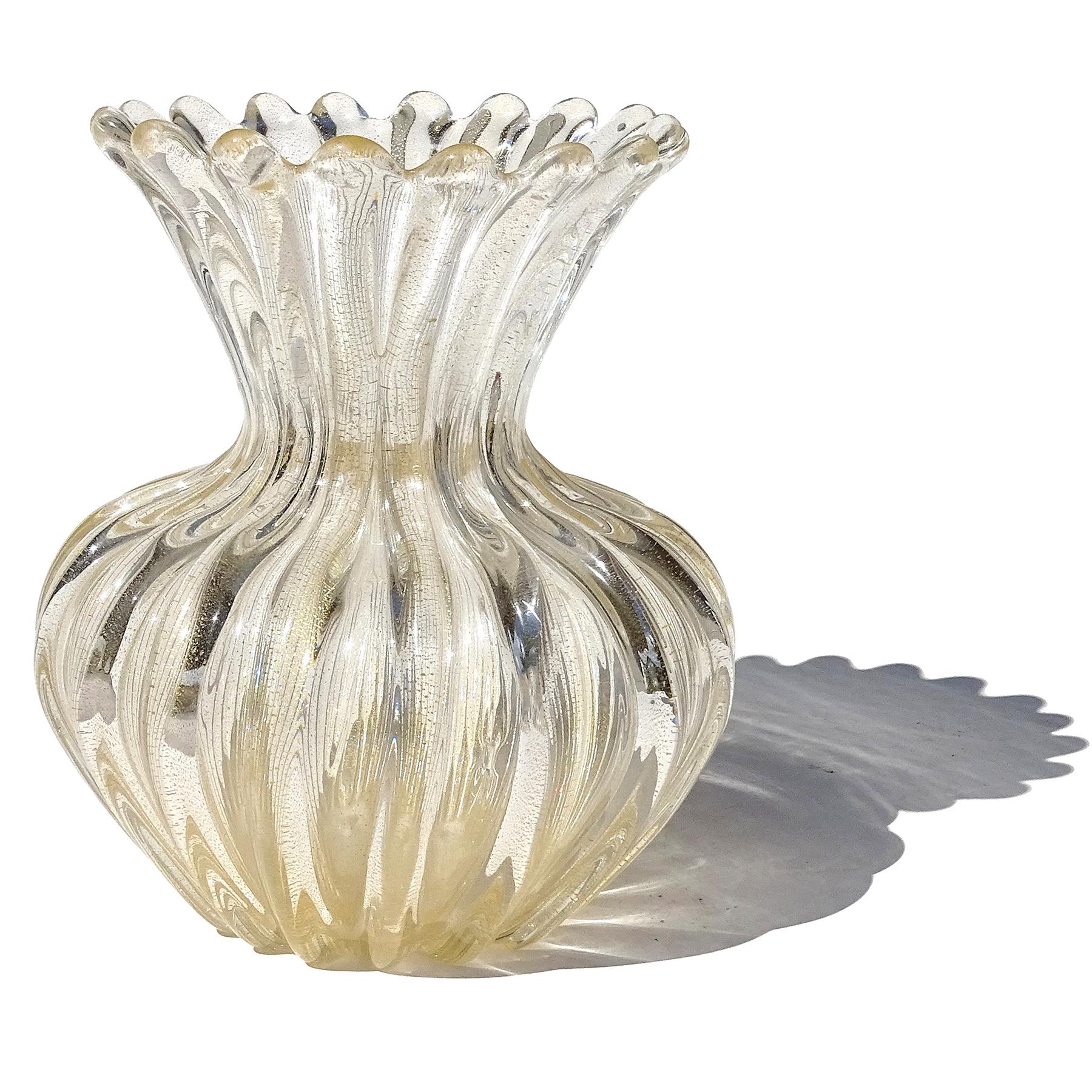 Beautiful vintage Murano hand blown clear and gold flecks Italian art glass flower vase. Attributed to the Seguso Vetri d'Arte company. The vase is signed 