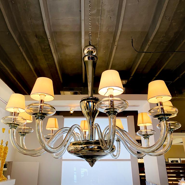 The Rugiada, Seguso Vetri d'Arte chandelier embody the nature of timeless Seguso style. Designed by Pierpaolo Seguso, developed with form, style technique, and different light translucencies, completely handcrafted and mouth-blown in the Seguso