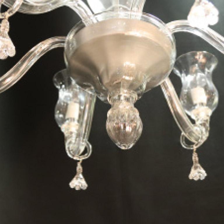 Seguso Vetri d'Arte chandelier embody the nature of timeless Seguso style. The technique, color color and translucencies, are ideal for a small room. Is with 6 lights, completely handcrafted and mouth blown in the Seguso Vetri d'Arte factory in