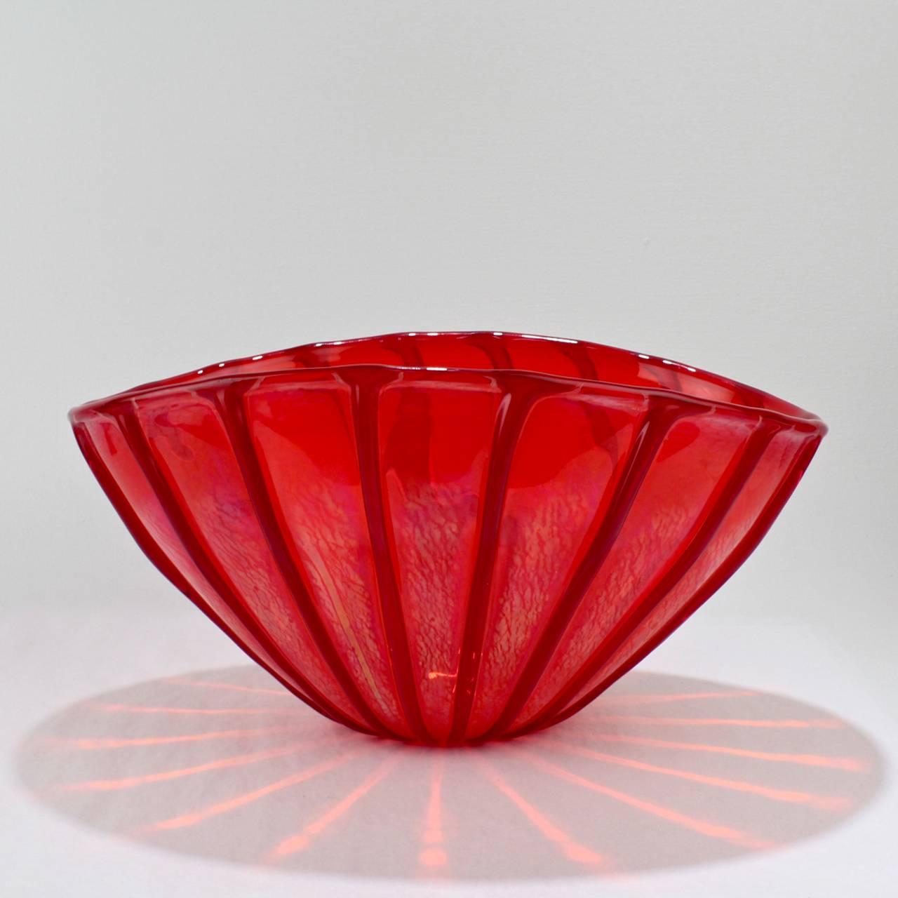 A large Nuance vase (or bowl) in red by Seguso Viro. 

Seguso Viro is the boutique branch of the Seguso brand. It was founded in 1993 as the brainchild of Giampaolo Seguso, son of Archimede. Focused on tradition and artistic impulse, this branch