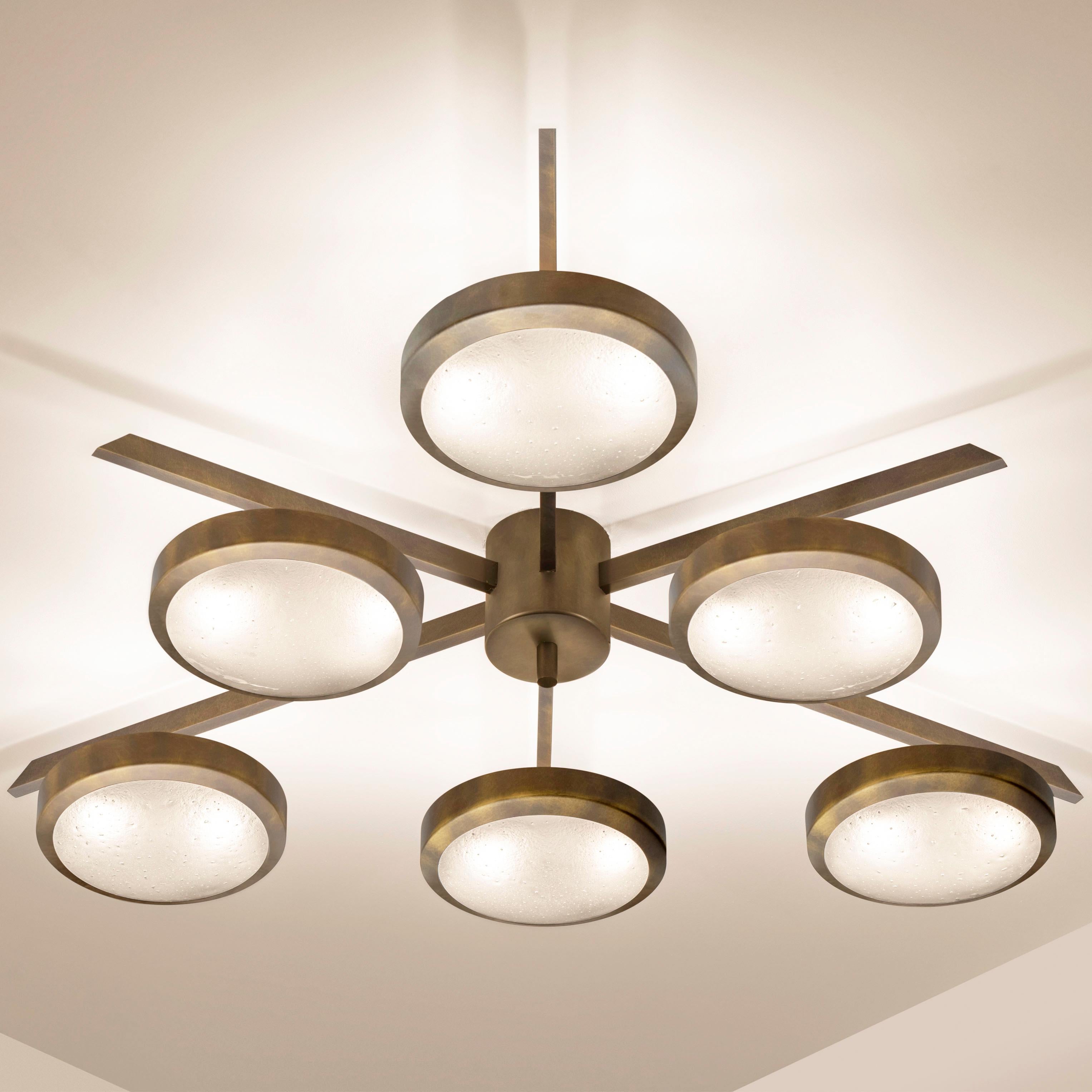 The Sei ceiling light is characterized by its star shaped frame with six suspended Murano glass shades. The first images show the fixture in our bronzo nuvolato (bronze) finish-subsequent pictures show it in a selection of alternative finishes.