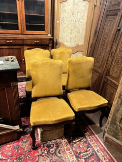 six of no. 4 solid walnut chairs with yellow velvet upholstery, Italy