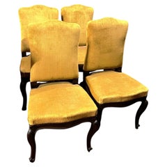six of no. 4 solid walnut chairs with yellow velvet upholstery, Italy