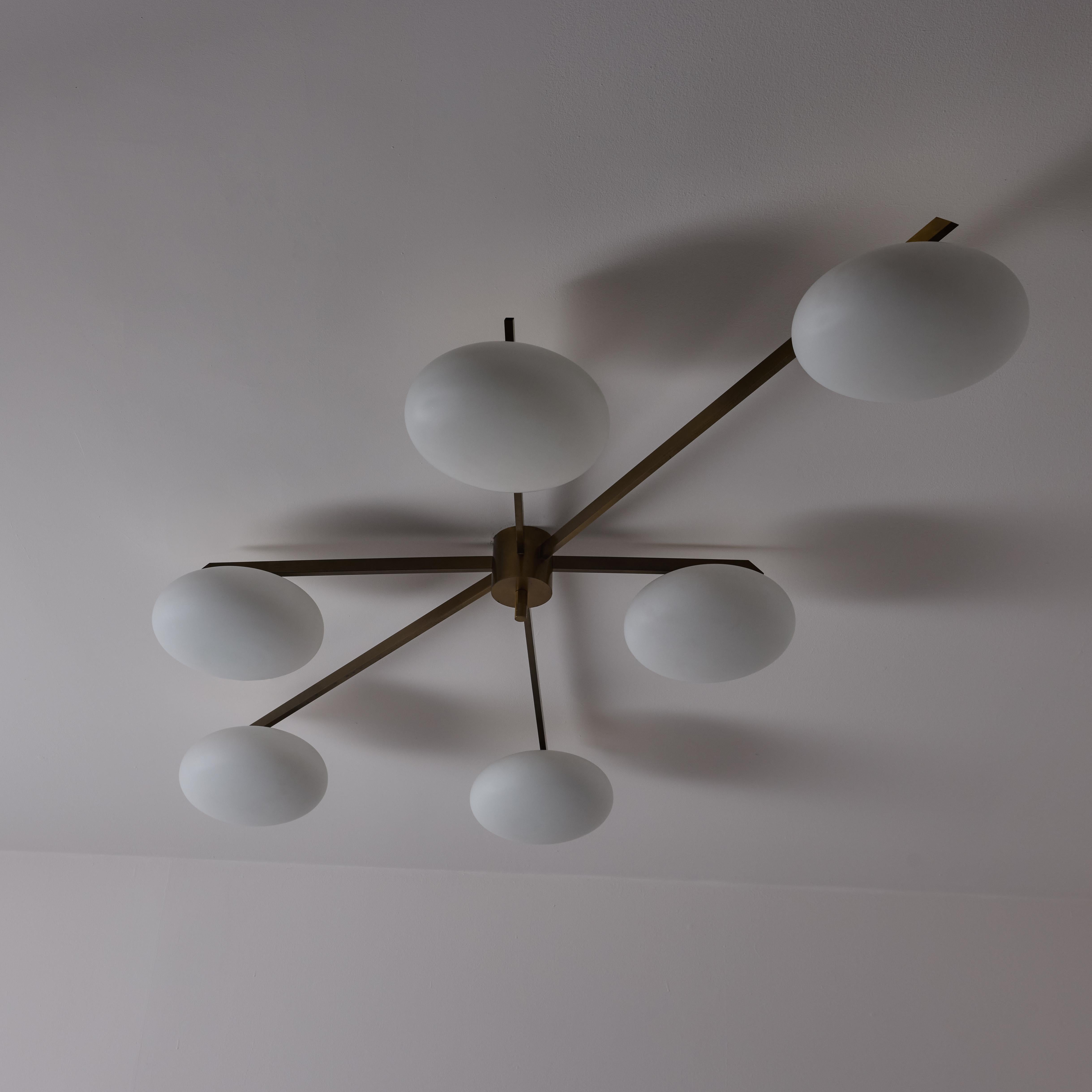 'Sei Lune' Ceiling Light by Angelo Lelii for Arredoluce. Designed and manufactured in Italy, 1961. Six shade ceiling light consisting of white opaline shallow glass shades and aged brass armatures. Each shade holds a single E27 socket-type, adapated