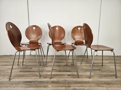 Six stackable dining room chairs by Calligaris