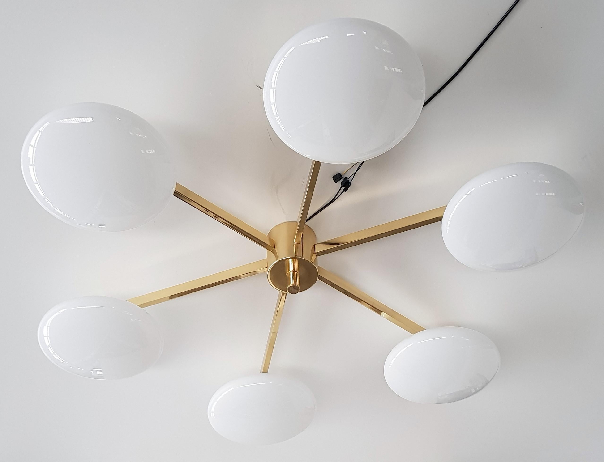Italian flush mount with Murano glass shades mounted on solid brass frame / Designed by Fabio Bergomi / Made in Italy
6 lights / E12 or E14 type / max 40W each
Diameter: 51 inches / Height: 8 inches
Order only / This item ships from Italy
Order