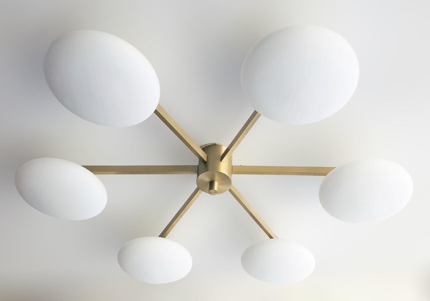 Italian flush mount with Murano glass shades mounted on solid brass frame / Designed by Fabio Bergomi / Made in Italy
6 lights / E12 or E14 type / max 40W each
Diameter: 51 inches / Height: 8 inches
Order only / This item ships from Italy
Order