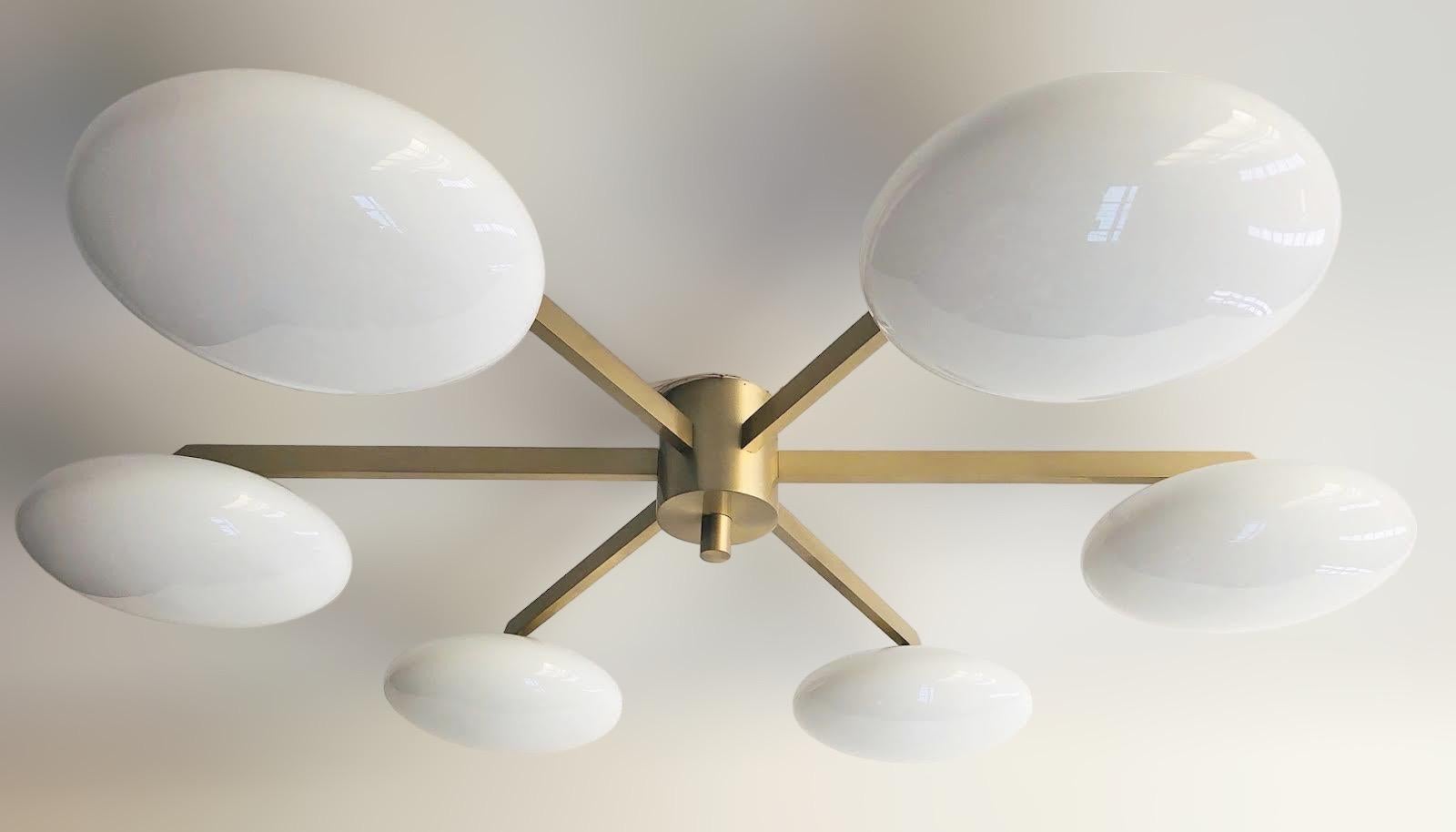 Italian flush mount with Murano glass shades mounted on solid brass frame / Designed by Fabio Bergomi / Made in Italy
6 lights / E12 or E14 type / max 40W each
Diameter: 51 inches / Height: 8 inches
Order only / This item ships from Italy
Order
