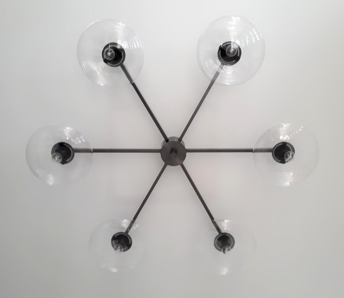 Italian flush mount with Murano glass shades mounted on solid brass frame / Designed by Fabio Bergomi / Made in Italy
6 lights / E12 or E14 type / max 40W each
Diameter: 51 inches / Height: 8 inches
Order only / This item ships from Italy
Order