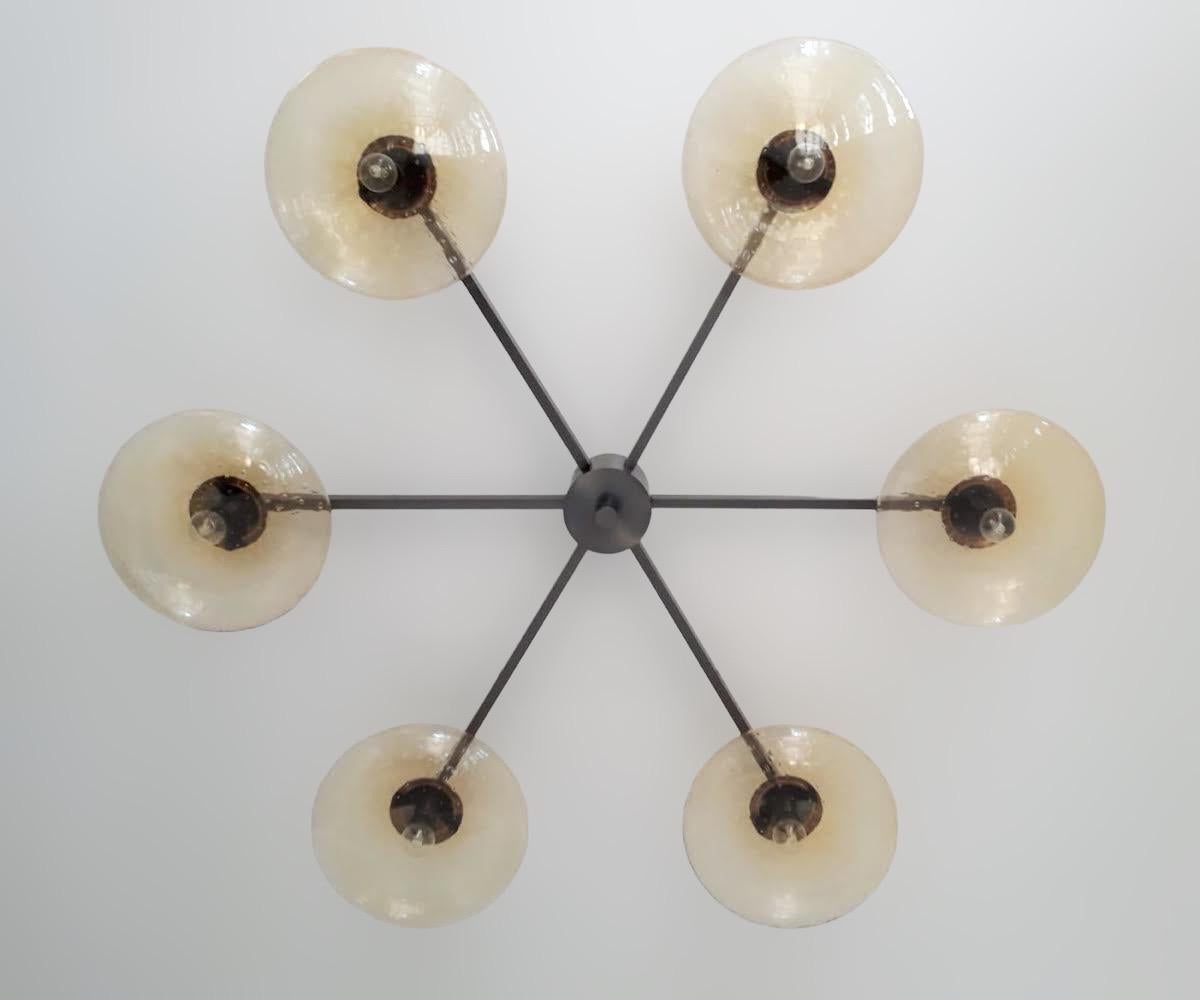 Italian flush mount with Murano glass shades mounted on solid brass frame / Designed by Fabio Bergomi / Made in Italy
6 lights / E12 or E14 type / max 40W each
Diameter: 51 inches / Height: 8 inches
Order only / This item ships from Italy
Order