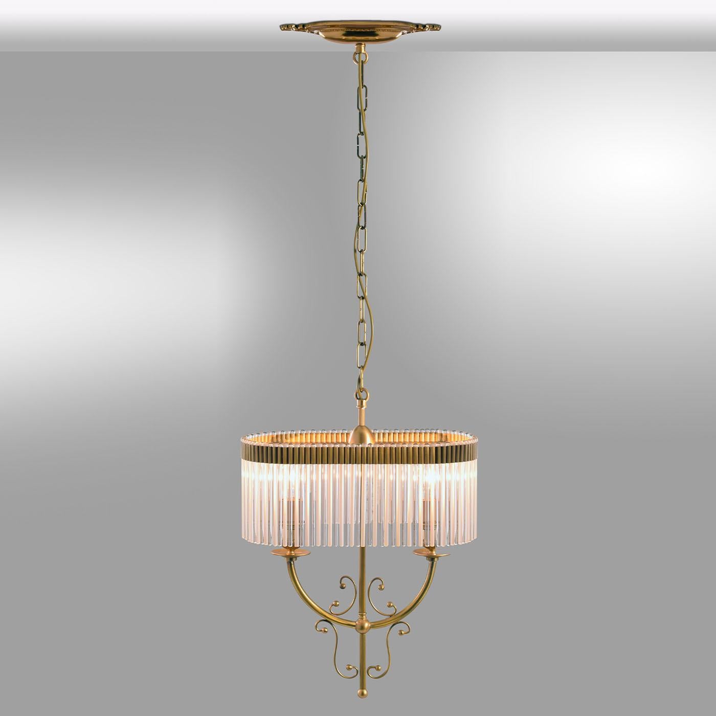 Luxury and elegance merge in this two-light chandelier Luca Bussacchini designed for the Seicento Collection. An array of glass reeds gets neatly juxtaposed to shape the oval-cut shade, which ensures the light coming from the two inner lightbulbs