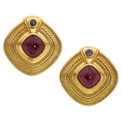 Orecchini con granato e tanzanite cabochon in oro giallo SeidanGang 18k