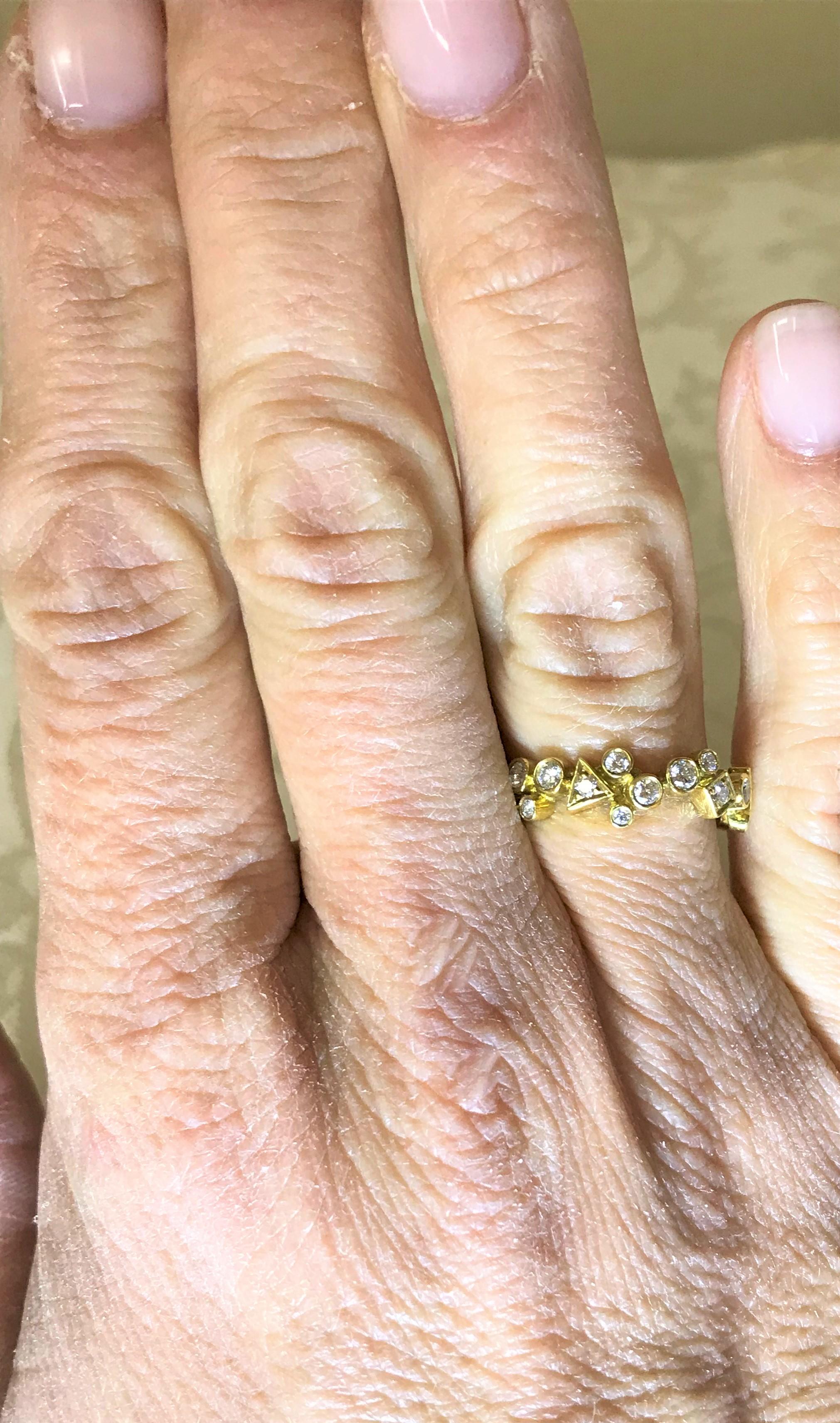 This amazing ring is whimsical and sophisticated! 
Ring by designer Seiden Gang, Jubilee Collection 
18 karat yellow gold
29  round diamonds, approximately .67 total diamond weight
Each diamond set in a round, heart, triangle or square shape
Stamped