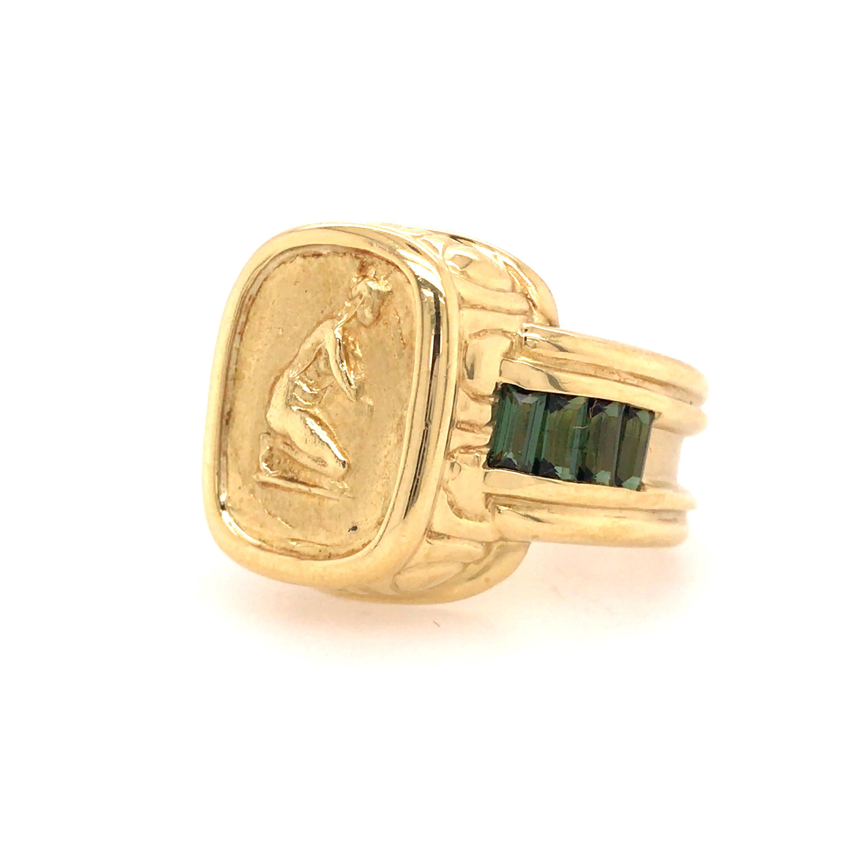 Seidengang 18K Yellow Gold Tourmaline Signet Ring.  (8) Tourmaline Baguette Gemstones weighing 1 carat total weight are expertly set.  The Ring measures 5/8 inch in length and 1/2 inch in width.  Ring size 7.  17.88 grams. Signed.