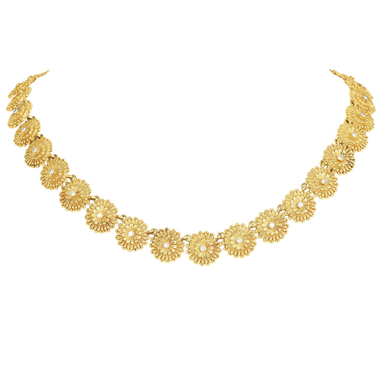 Adorned yourself with a dazzling gold and diamond Seidengang necklace. this piece is crafted in 18k green gold. These gold flower disks,  each set with a round diamond, bezel set,  approx. 34 round diamonds weighing approx. 0.75 carats, G-H color,