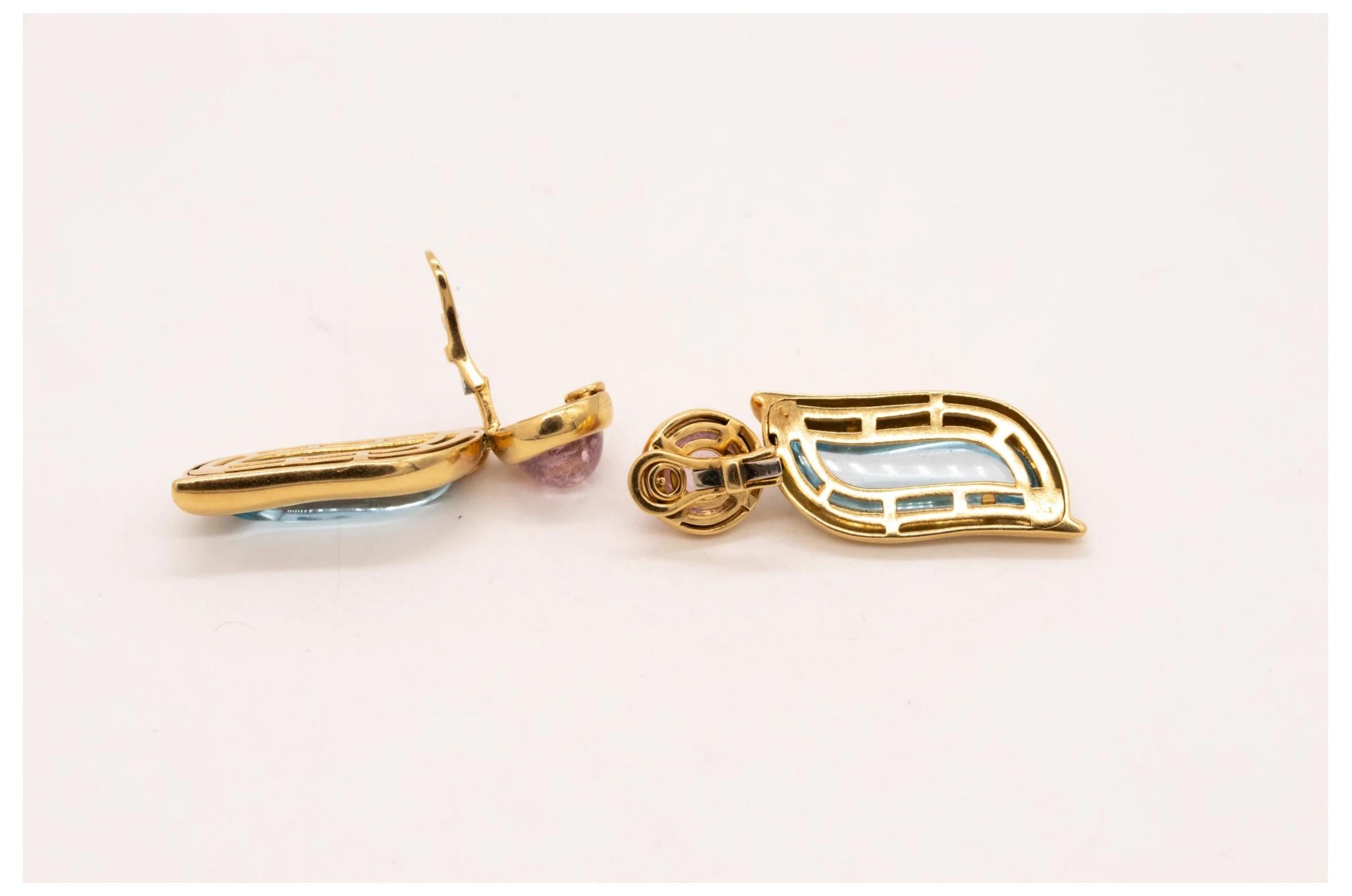 Pair of colorful drop earrings designed by SeidenGang.

Beautiful modern long pair, made by the jewelry designer's SeidenGang. These colorful earrings was crafted in solid yellow gold of 18 karats, with high polished finish. They are suited with