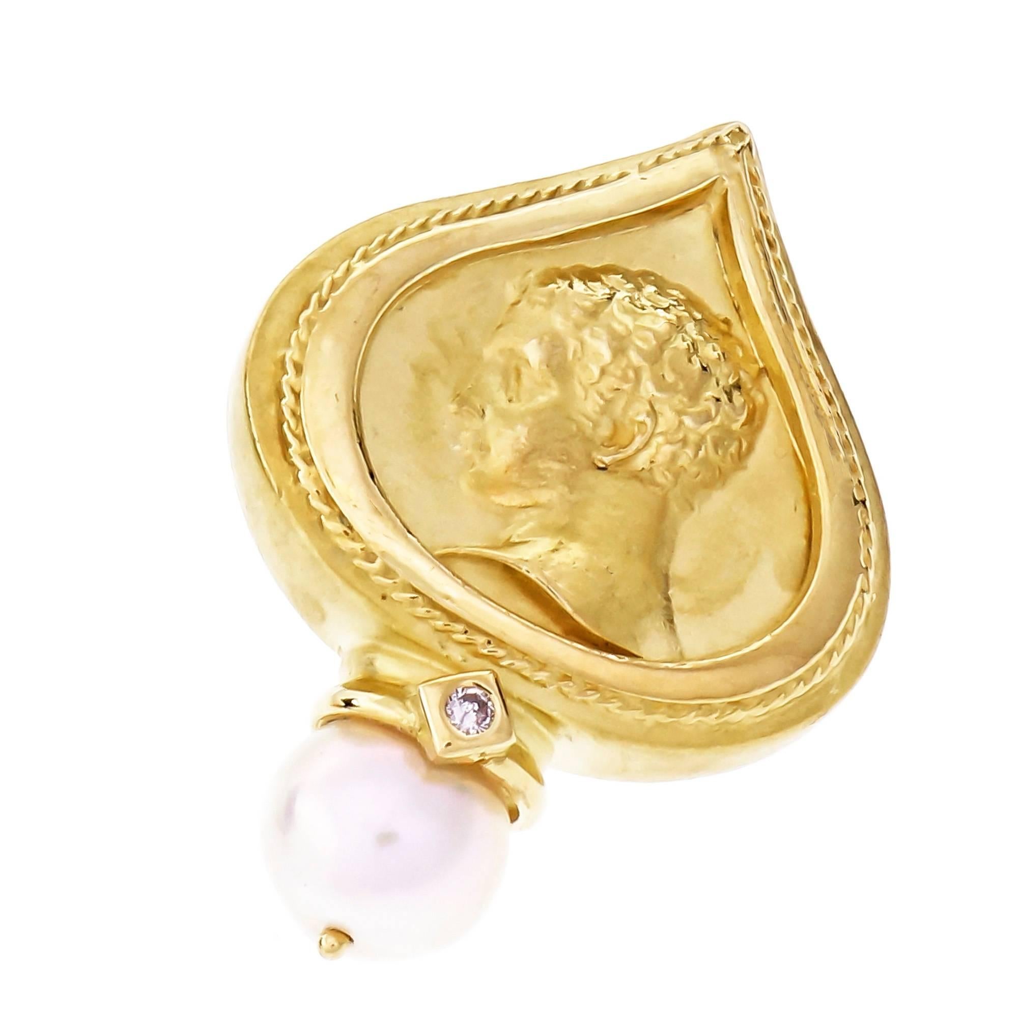 SeidenGang all original 18k yellow gold clip post earrings with bright cultured Pearls and full cut Diamond accents.

2 round Diamonds, approx. total weight .06cts, H, SI1
2 cultured Pearls white with pink overtone, 9.0mm
18k yellow gold
Tested and