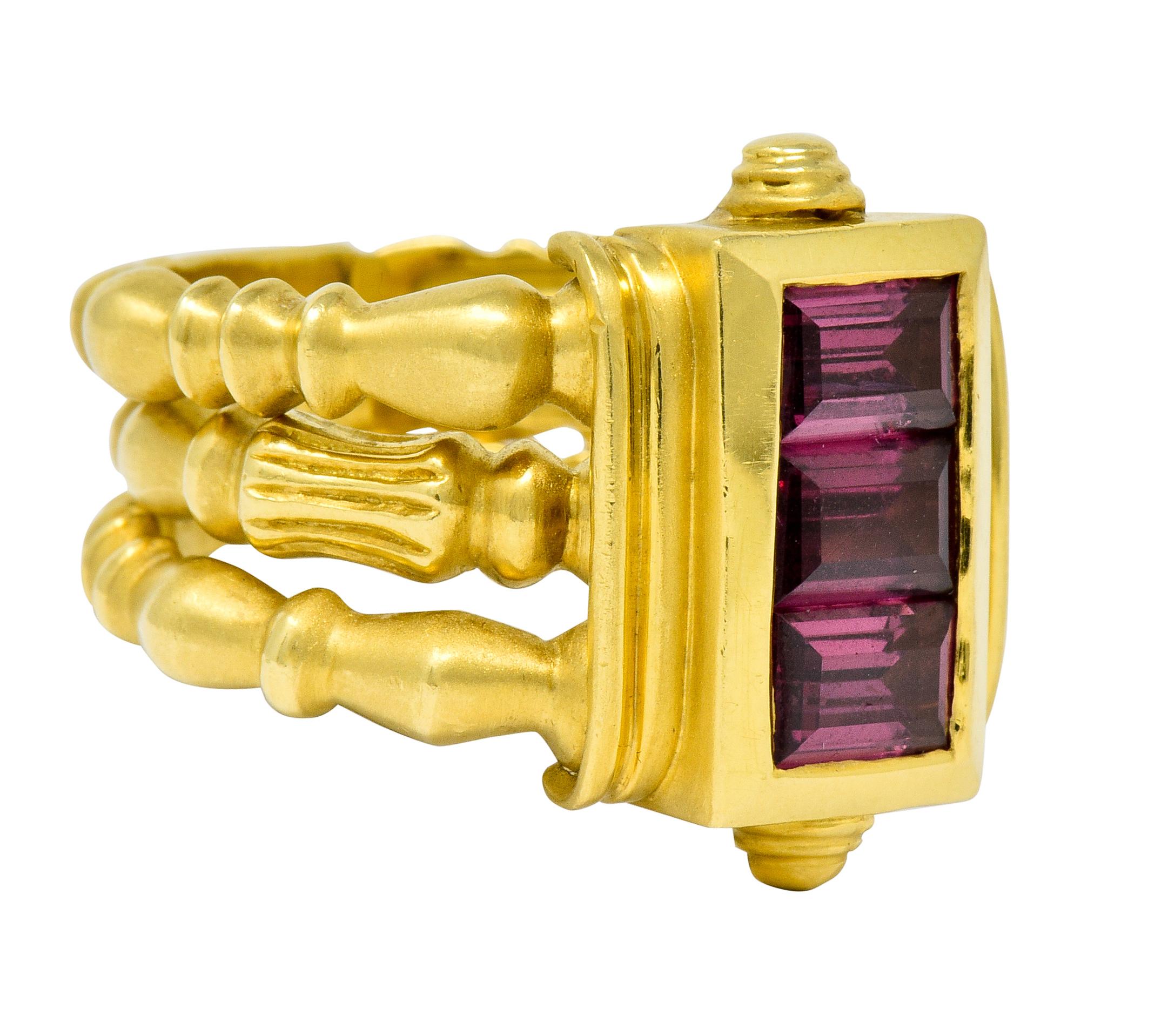 Ring is designed as three articulated bamboo style bands

Connected via rectangular center station, deeply ridged and with gold accents North and South

Channel set with three rectangular cut rhodolite garnets, incredibly well-matched and
