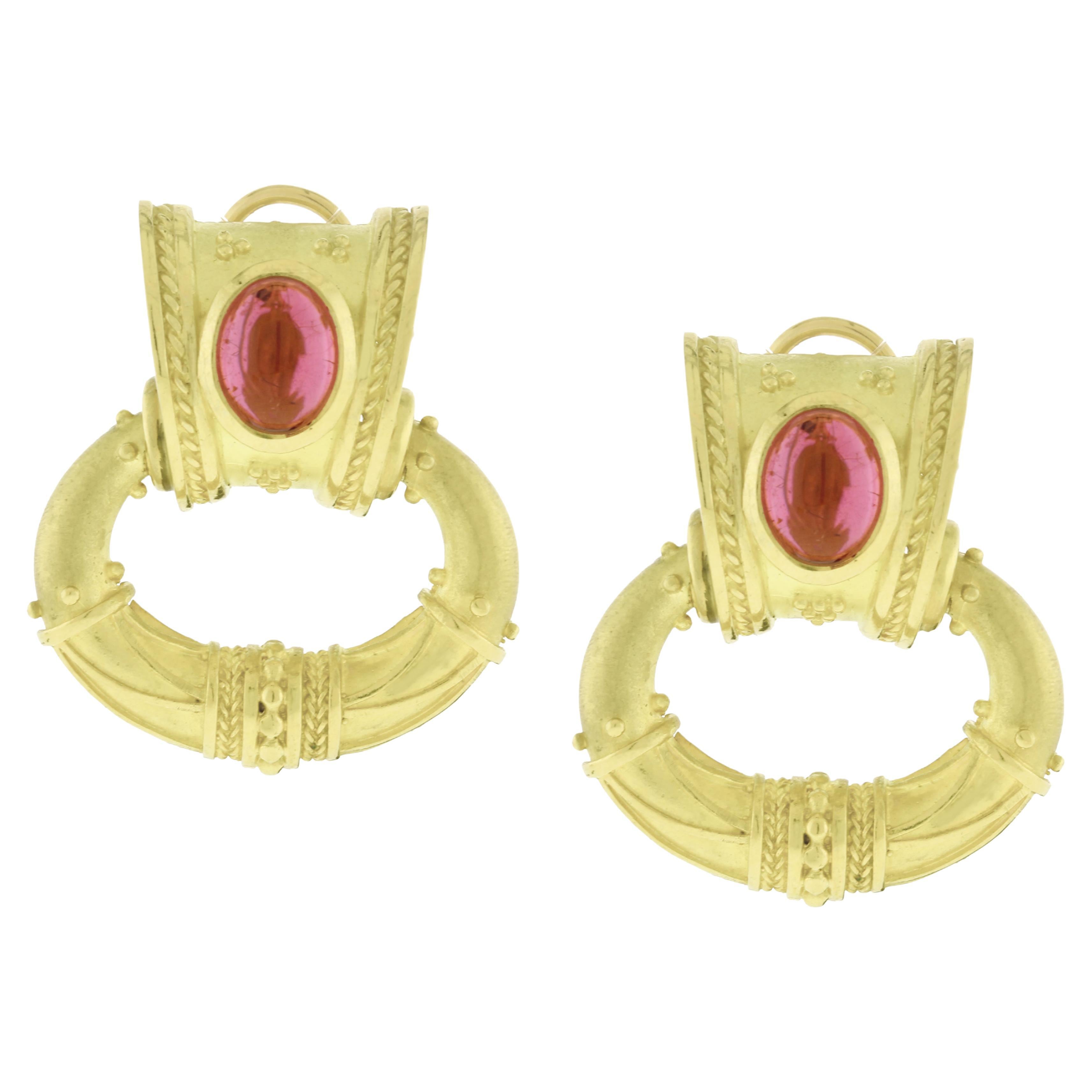 From the SeidenGang collection of antiquity-inspired jewelry a pair of cabochon pink Tourmaline earrings.  Carol Seiden and Carolyn Gang were inspired by a rare collection of Greek and Roman mythological designs.  The duo created jewelry that was
