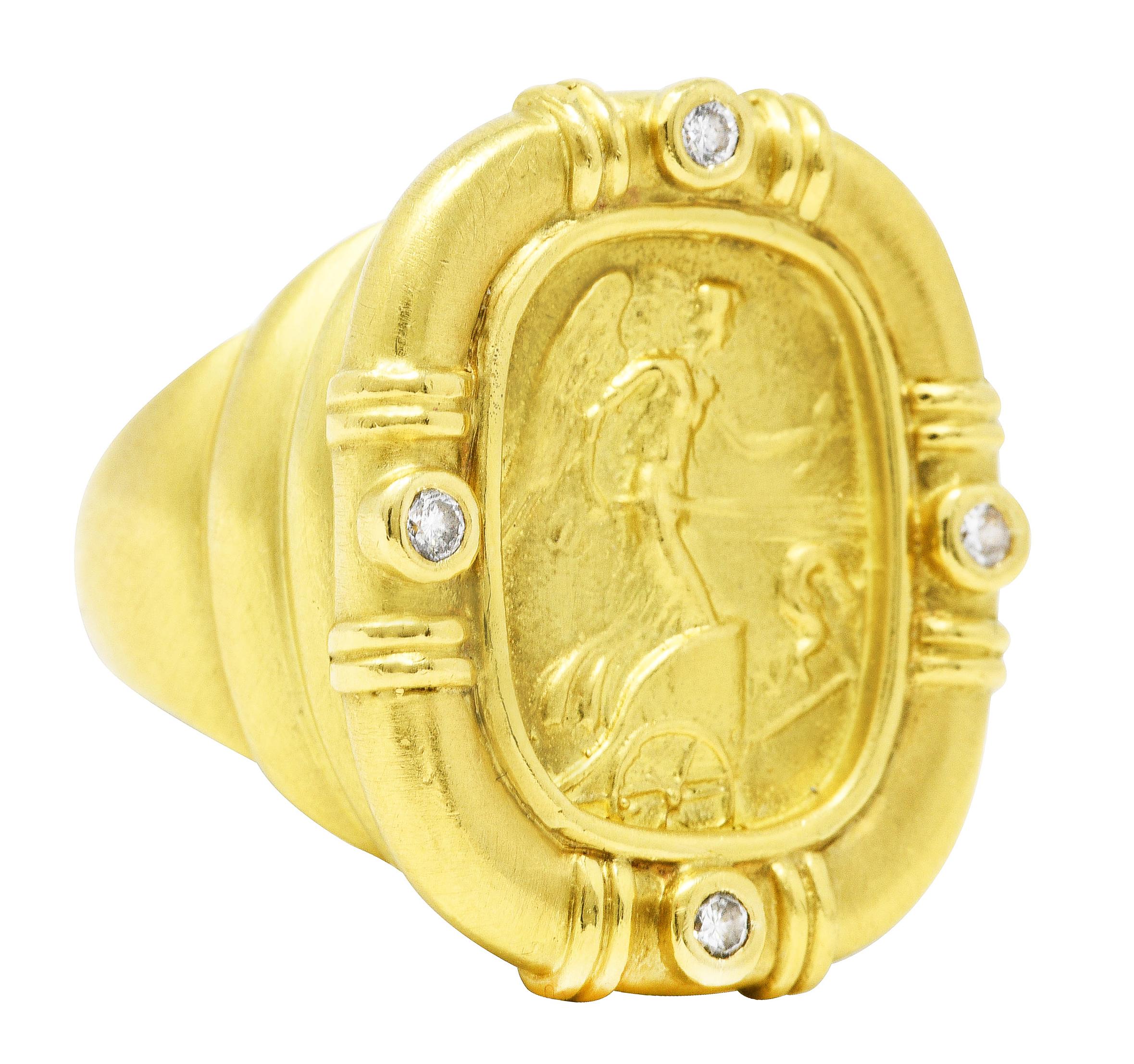 Ring centers a rectangular repoussè cameo of the winged Greek figure Nike atop a chariot

With fluted surround accented by bezel set round brilliant cut diamonds at cardinal points

Weighing approximately 0.12 carat total - eye clean and