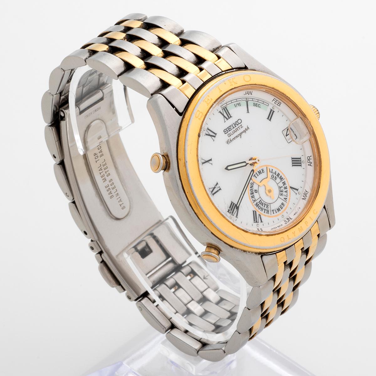Il nostro rarissimo Seiko 6M25 6050 è stato prodotto per celebrare il cronometraggio Seiko delle Olymp del 1992. La cassa misura 38 mm ed è in acciaio/oro. Vanta un movimento complesso con sveglia, cronografo retrogrado 1/10, mese e timer, tutti