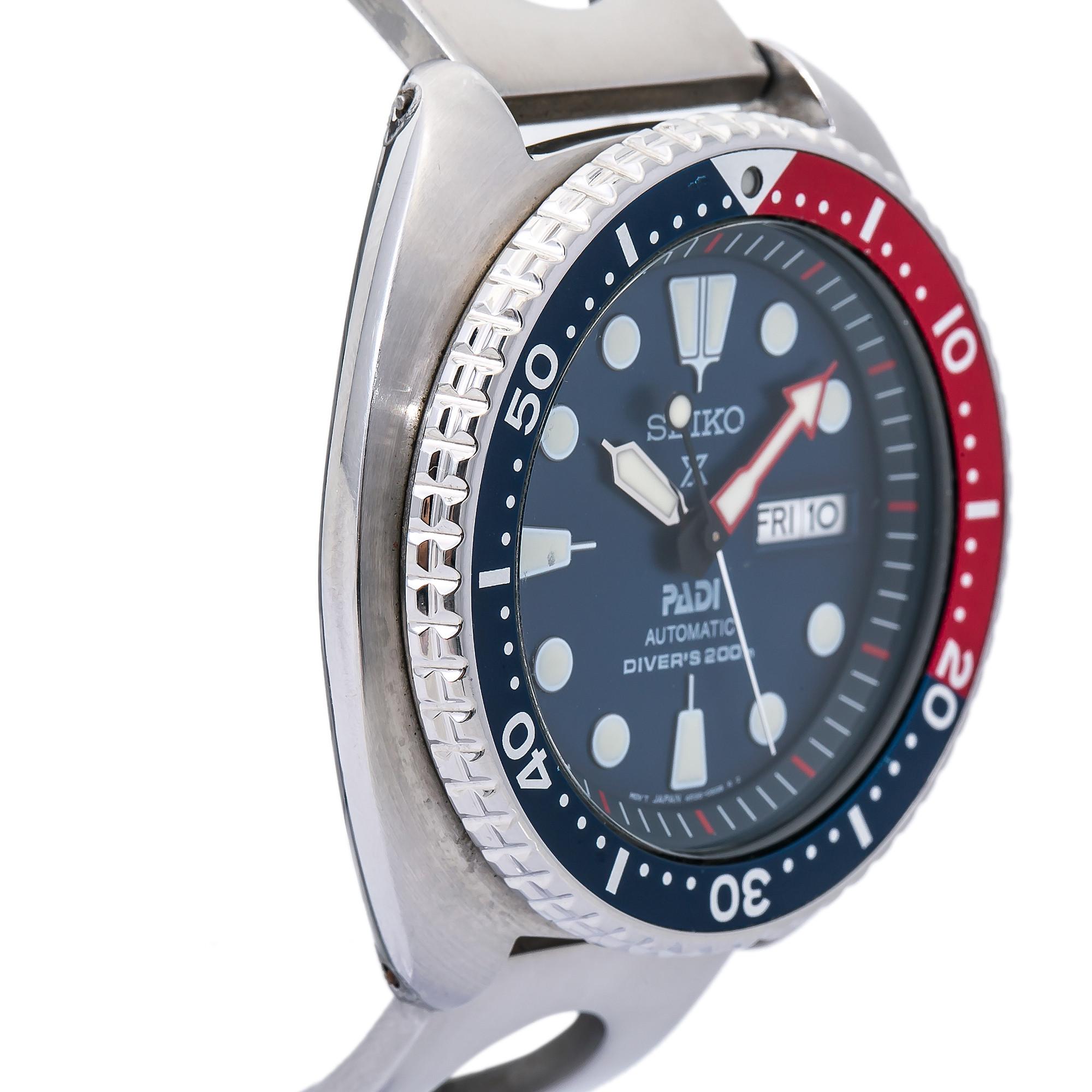seiko men's blue and red bezel watch