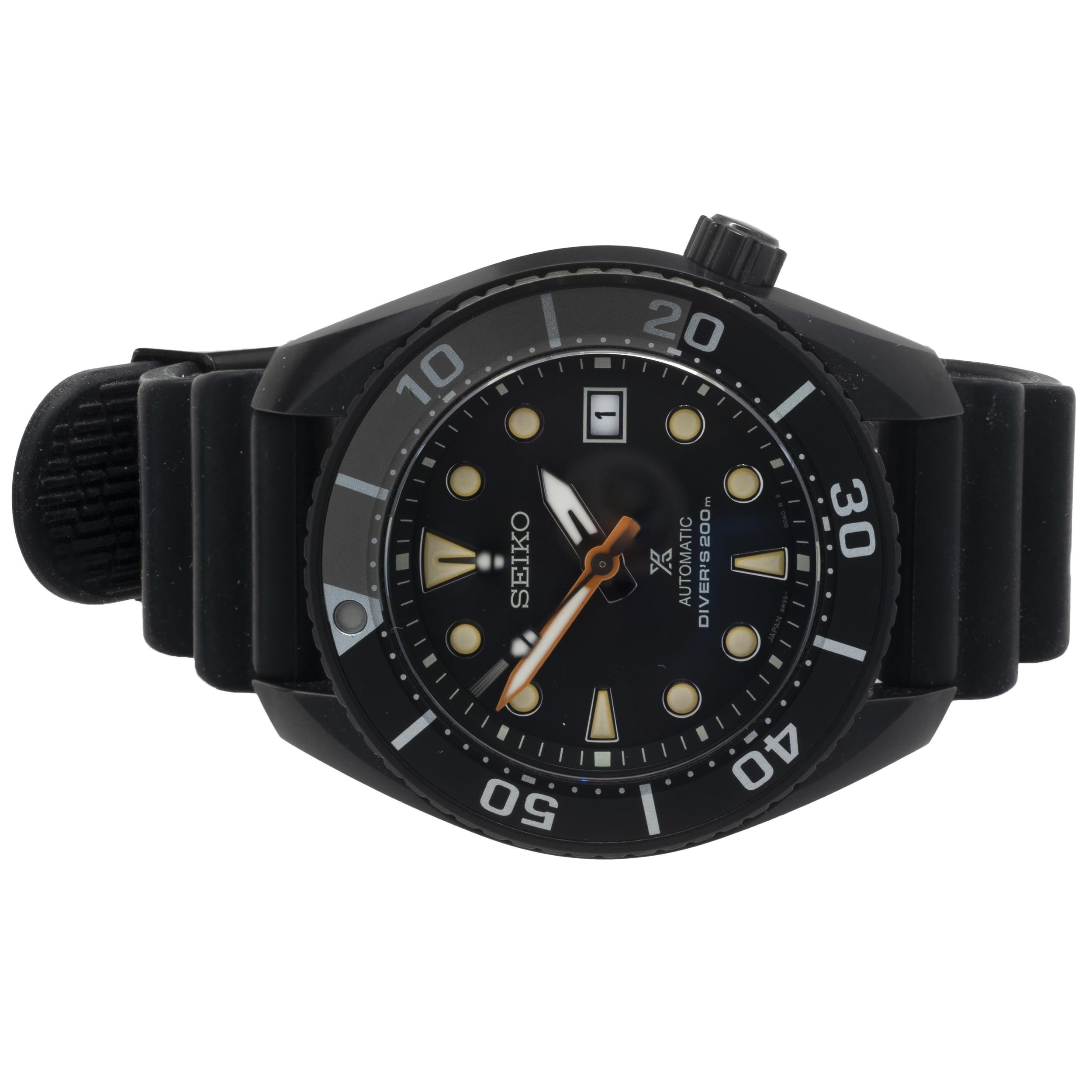 Designer: Seiko
Movement: automatic
Function: hours, minutes, seconds, date, rotating diver’s bezel
Case: round 45mm black stainless steel case, sapphire protective crystal, screw-down crown
Band: black Seiko rubber strap with buckle
Dial: black