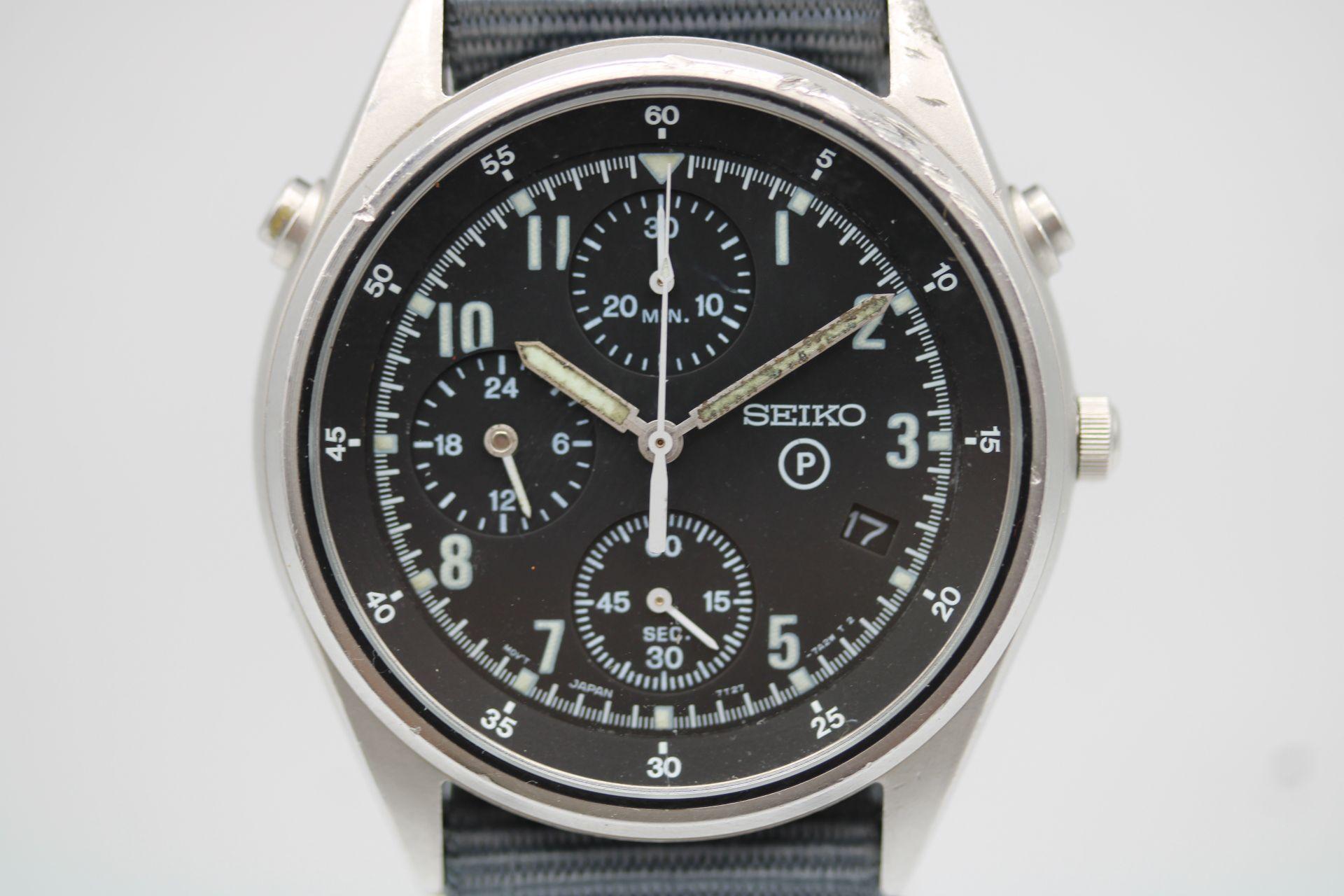 
This Seiko Generation 2 British Military Issued Chronograph arrives with us in its original condition with all markings to case back.

38mm stainless steel case with fixed lug bars as was required by the British Military unlike the civilian made
