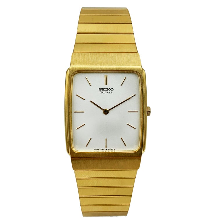 Seiko Gold Tone Stainless Steel Quartz Unisex Watch For Sale at 1stDibs |  seiko quartz watch gold, seiko gold rectangle watch, seiko quartz gold