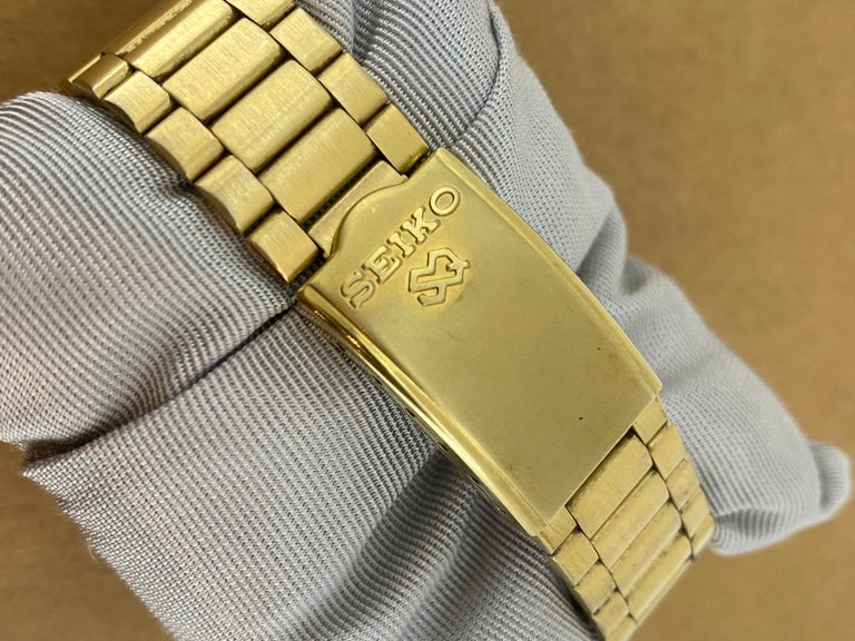 Seiko SQ100 Quartz Day-Date Champagne Dial Gold-Plated Box