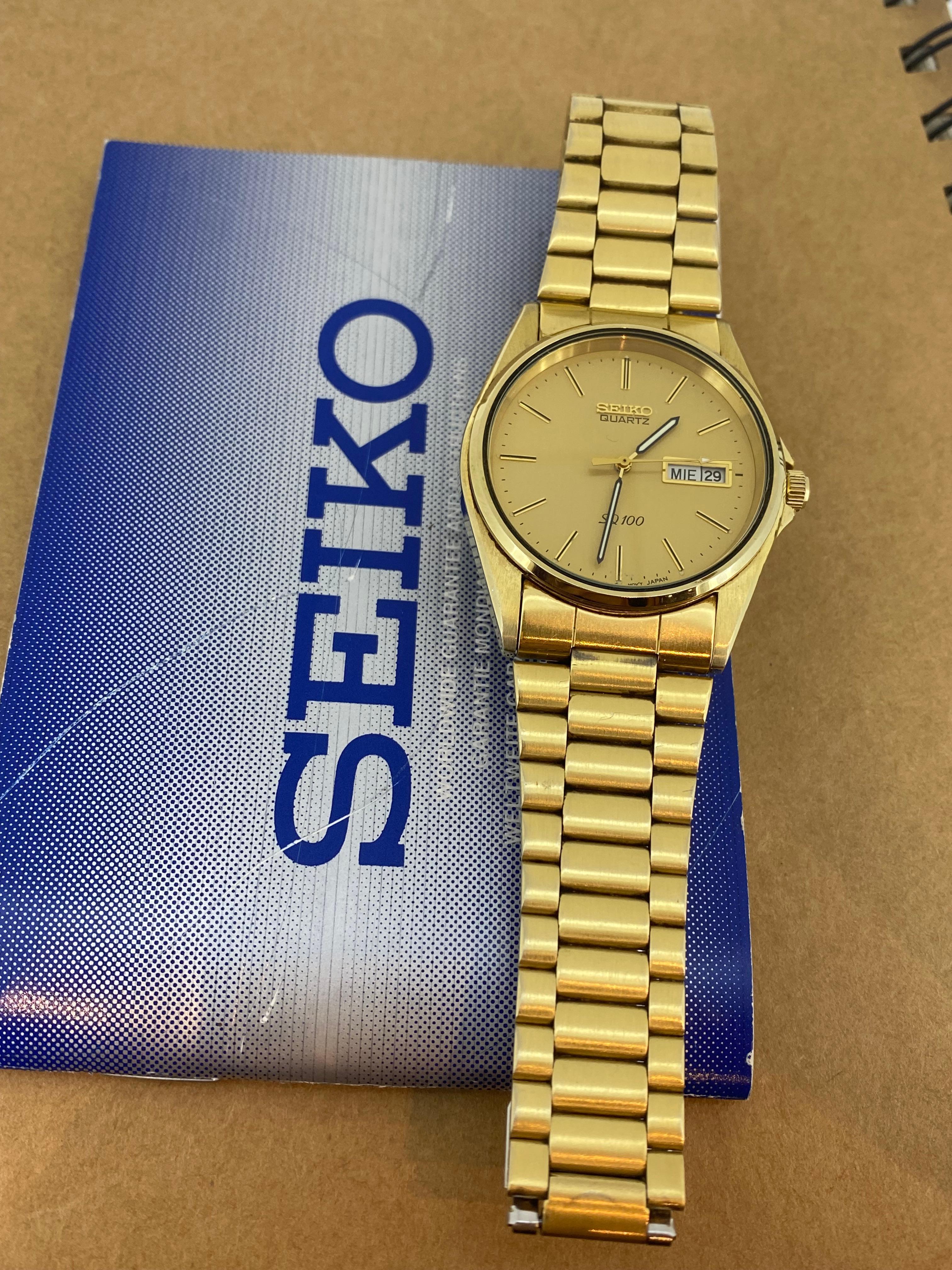 Seiko SQ100 Quartz Day-Date Champagne Dial Gold-Plated Watch. Box + Papers. im Angebot 3