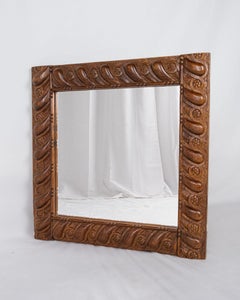 Seiz Breur style square mirror in carved wood, Brittany, France, early 20th