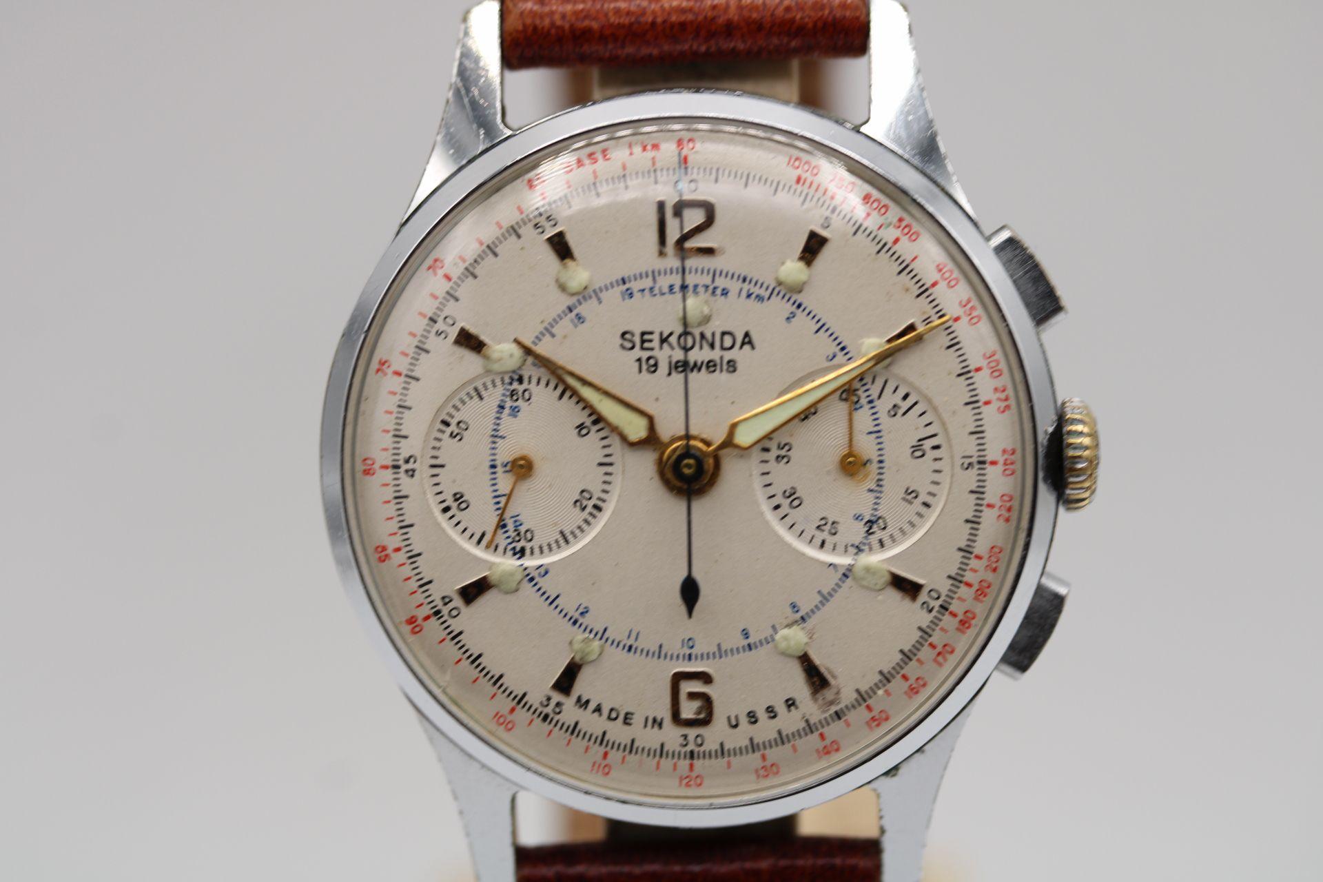 Watch: Sekonda Strela 3017 Chronograph
Price: £850
Stock Number: CHW5294

This Sekonda Strela 3017 Chronograph made in the late 50's or 60's in the USSR is in fine working order having passed through the hands of our watchmaker.

With a Movement 21