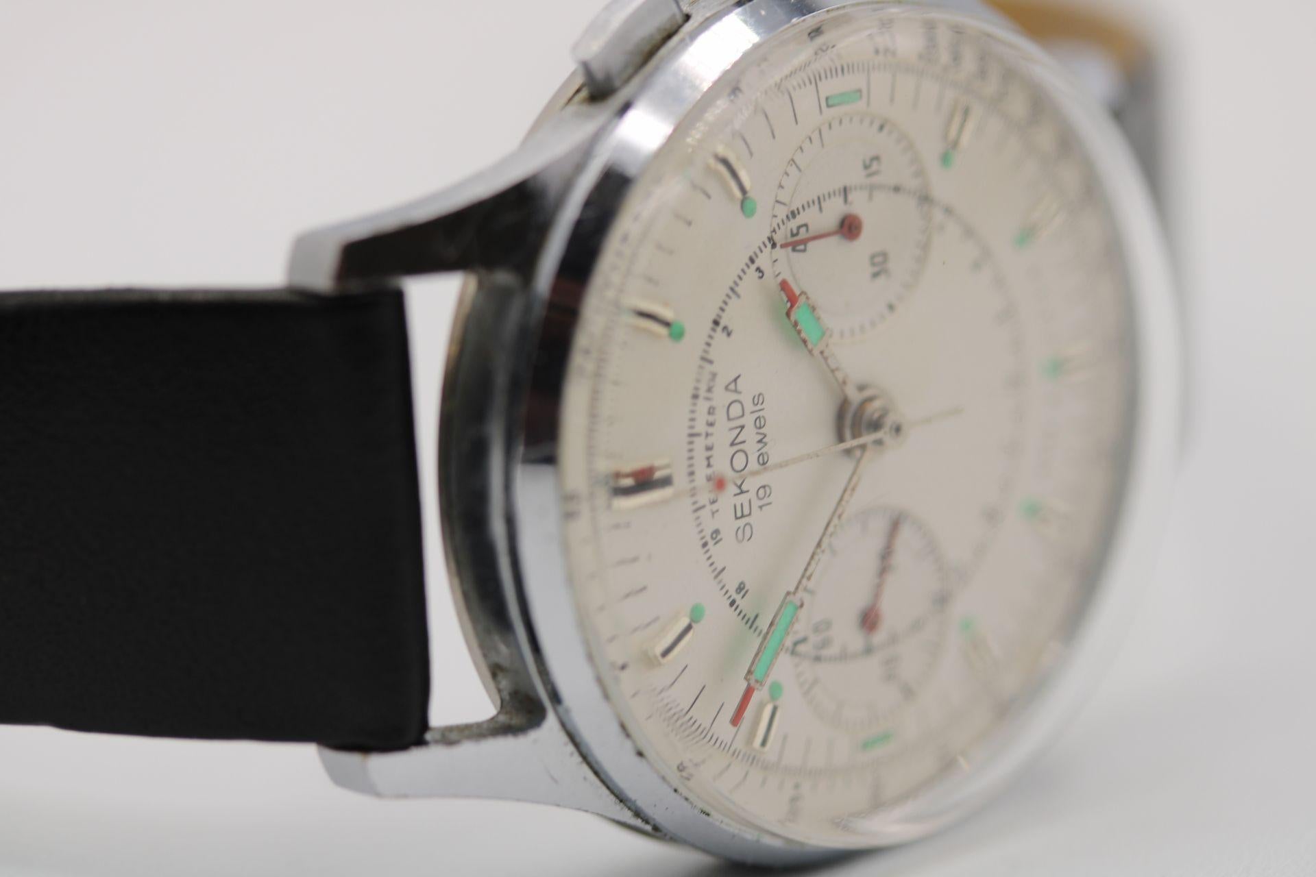 Watch: Sekonda Strela Chronograph
Stock Number: CHW5291
Price: £1,250.00

A rare find, this Sekonda Strela Chronograph as was expected is signed 1st Moscow watch Factory by its logo under the movement balance.

White dial with silver baton hours
