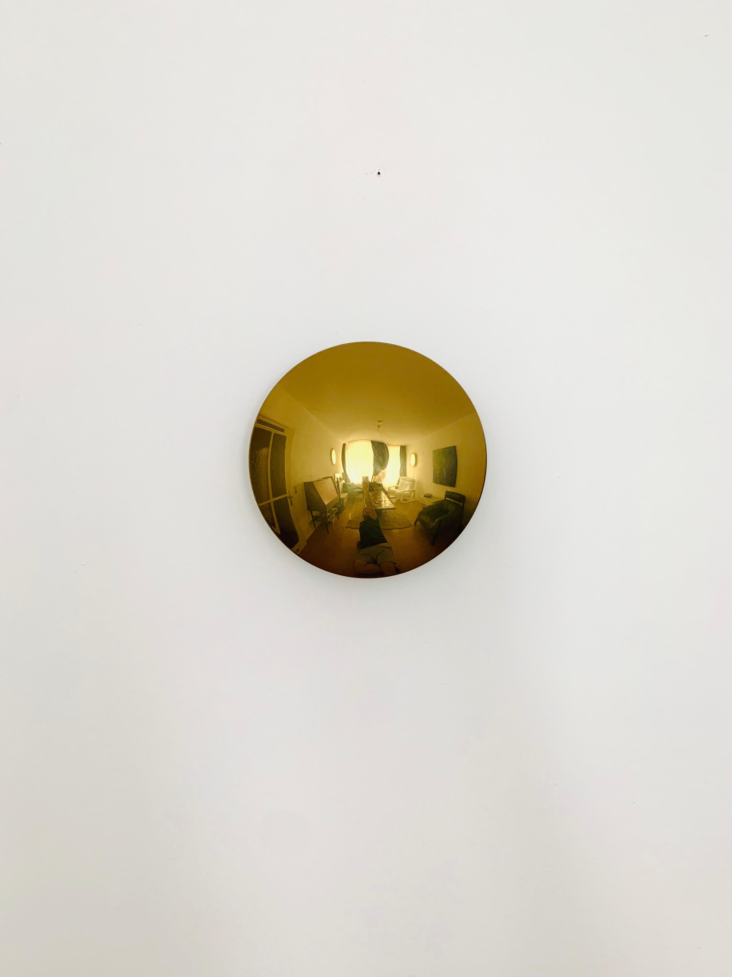 Very nice brass wall or ceiling lamp from the 1970s.
The lighting effect of the lamp is extremely beautiful.
The lamp creates a very cozy atmosphere and is of very high quality.

Design: Florian Schulz
Sela 40.

Condition:

Very good vintage