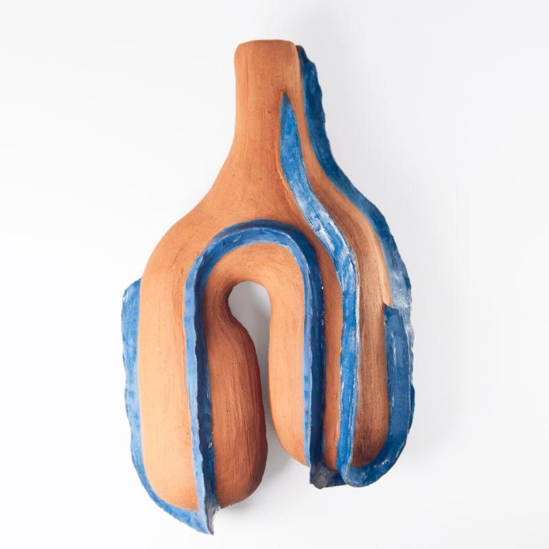 Selamawi wall vessel, fin by TheUrbanative
Dimensions: W16 x D7.5 x H28 cm
Material: Wall hung ceramic with glazed fin details. Vessel comes with steel plate wall hanging bracket.

Also available: Different Shapes of Selamawi Ceramic