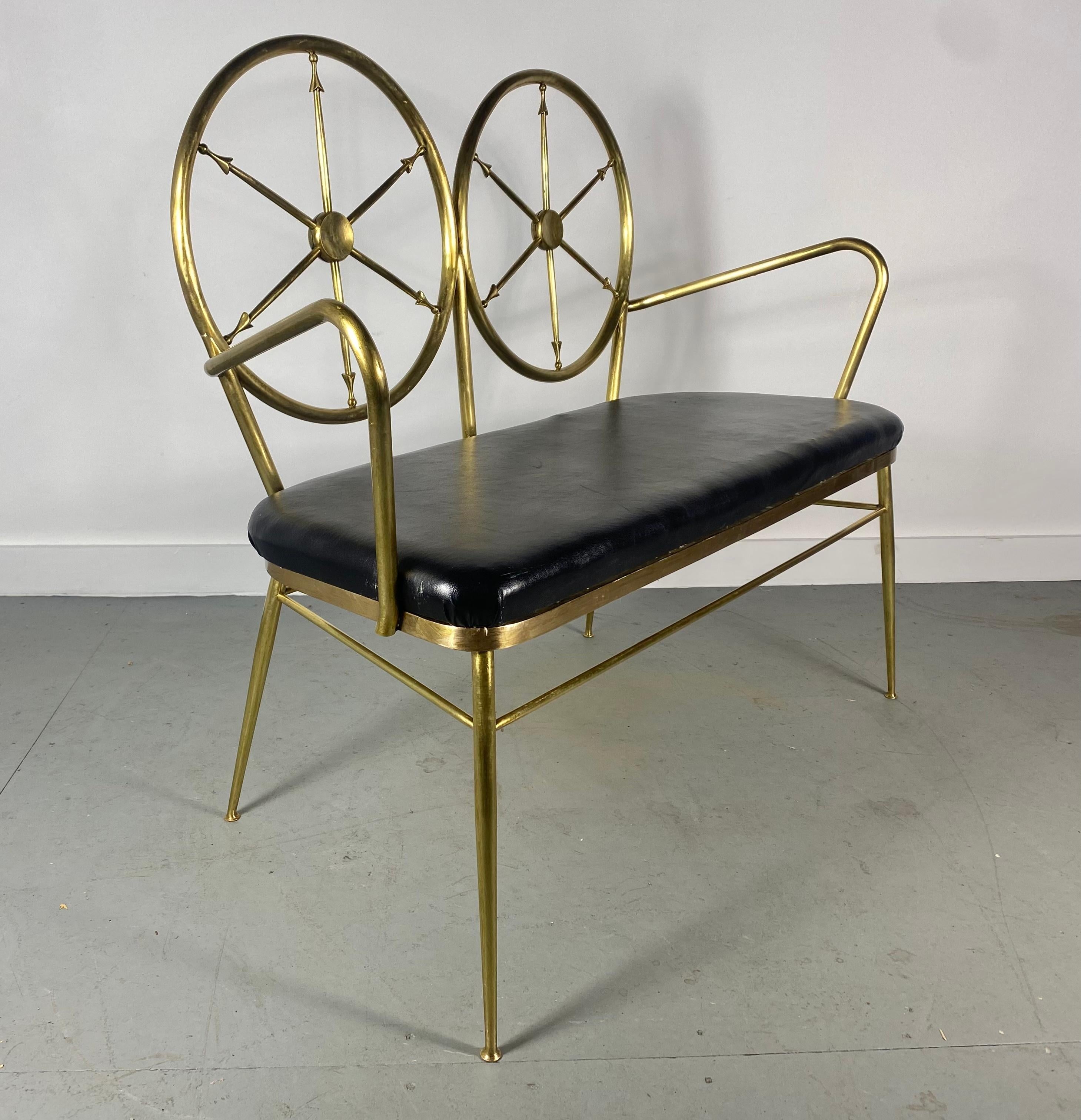 Seldom seen brass compass 2-seat bench manner of gio point. Made in Italy. Amazing quality. Retains original brass finish, wonderful patina. Also retains its original black leather seat. Imprint stamp. Made in Italy. Arm Height 26.5. Hand delivery