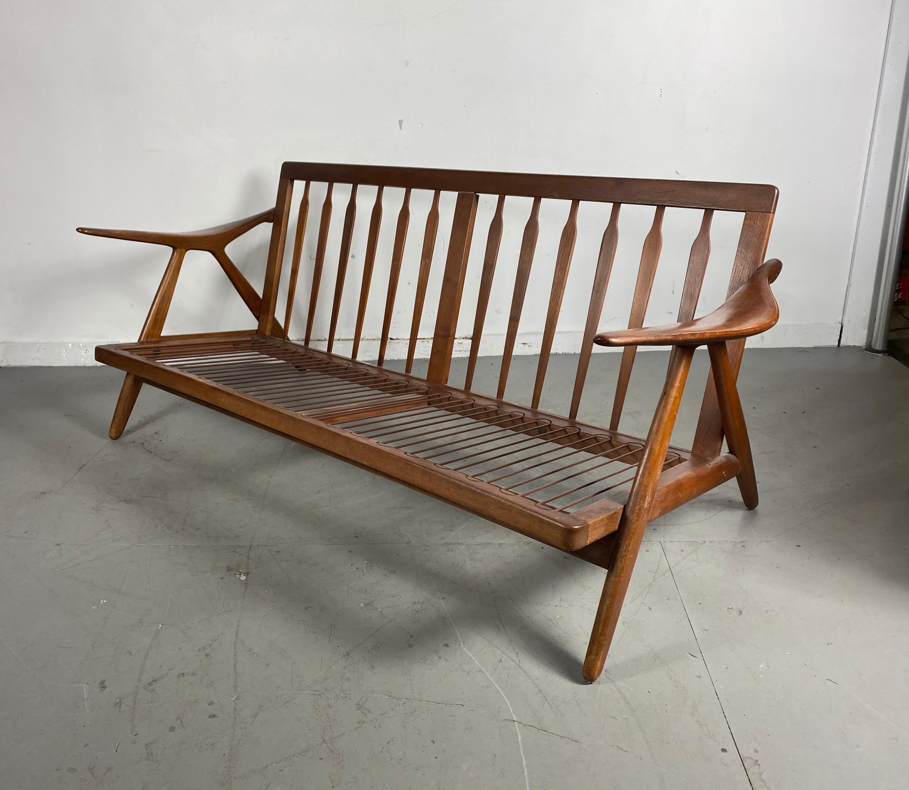 Rare Danish modern sofa (frame) designed by Arne Hovmand Olsen for Mogens Kold. In original estate condition. Retain original finish, patina showing just the right amount of cosmetic wear to finish, minor nicks and scuffs etc. chic, stylish,