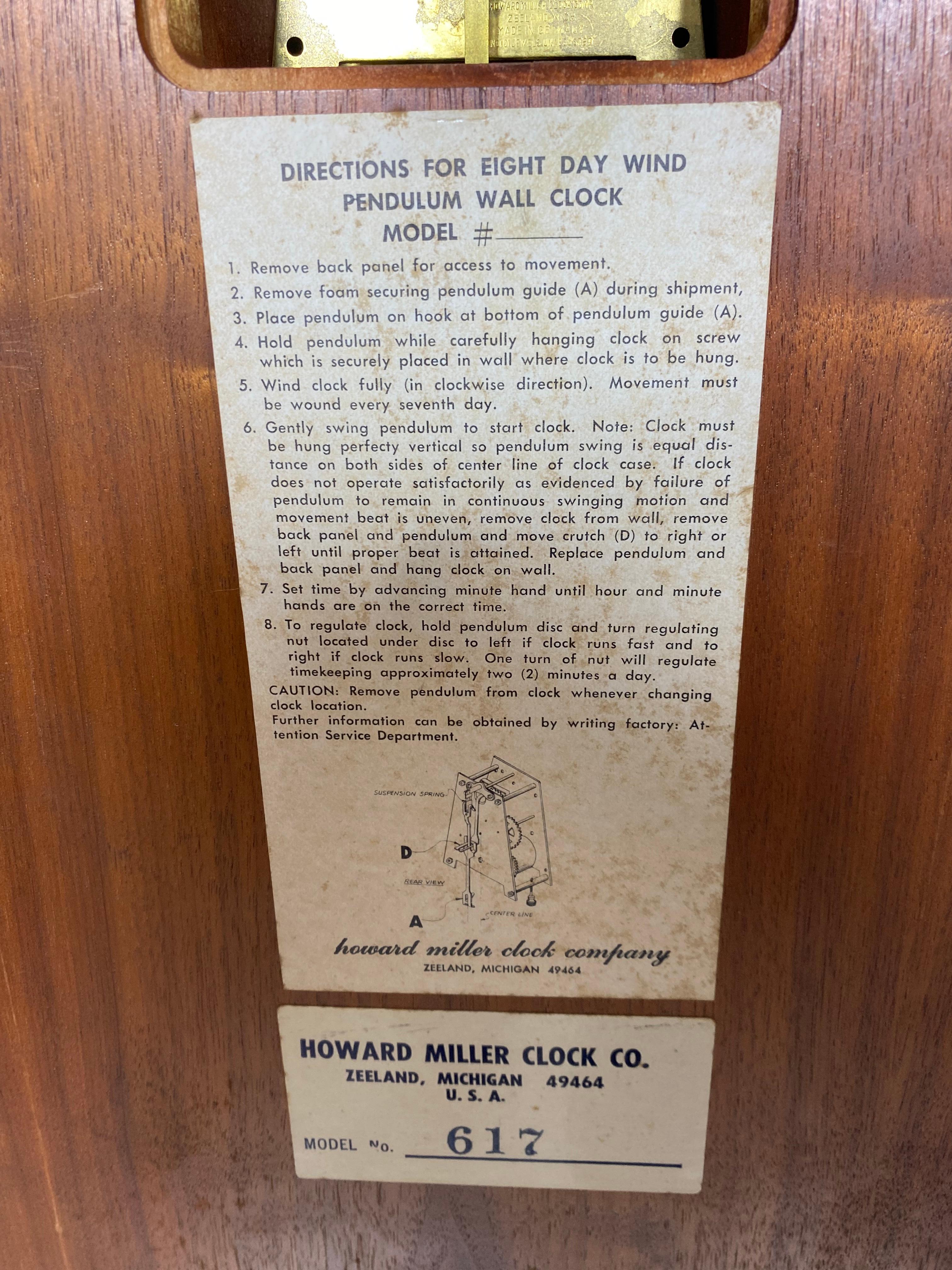 Seldom Seen Exotic Wood Modernist Wall Clock by Howard Miller In Good Condition In Buffalo, NY