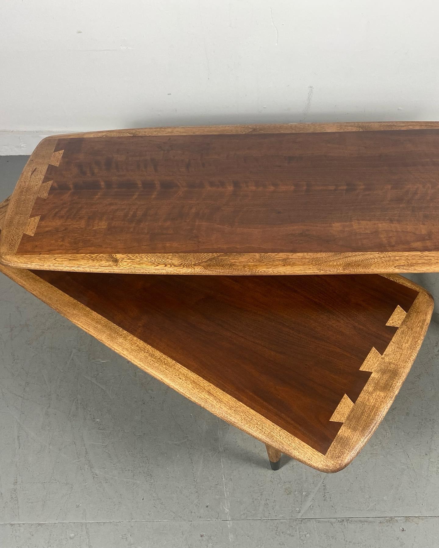 Seldom seen LANE 'switch-blade coffee / cocktail table..classic mid century modern,, Ingenious design,, can be used in several different configurations..straight,, straight tiered, or L-Shape,,, Stunning two-tone wood grain,, dove-tail joinery.