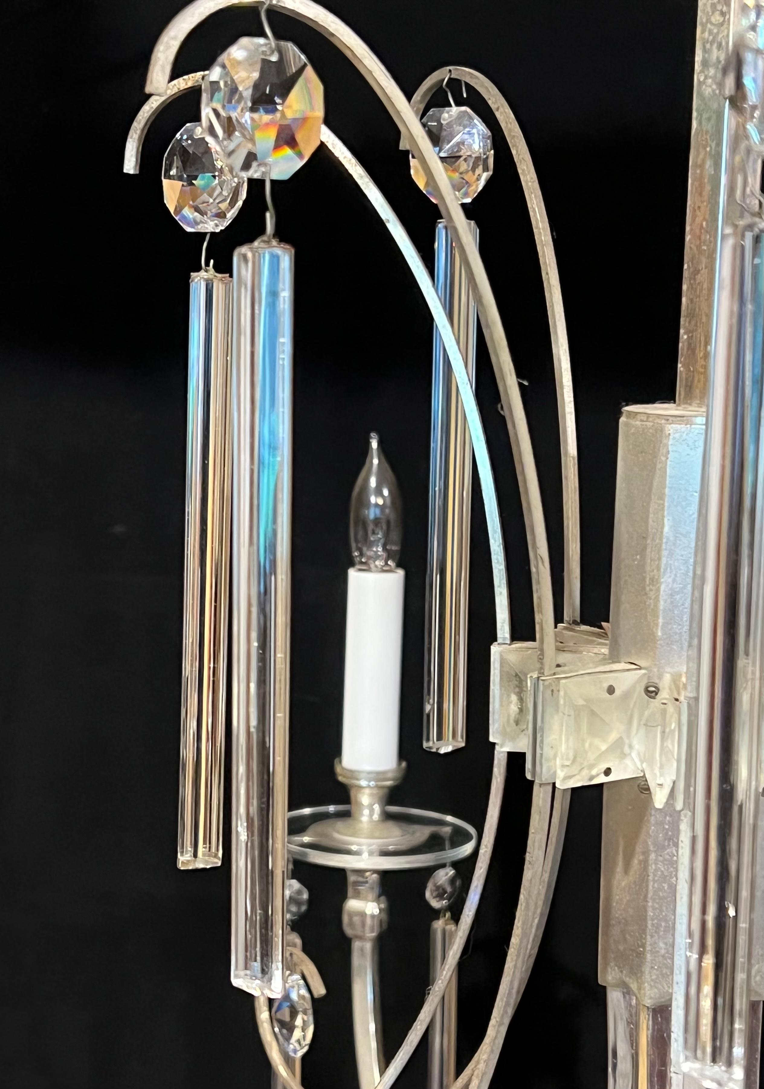 very rare silver plate and lead crystal Sciolari chandelier, Purchased in 1970 from original owner. Modern and elegant this chandelier has unique triangular pencil drops topped with faceted baguette crystals, Classical shape with very clean lines