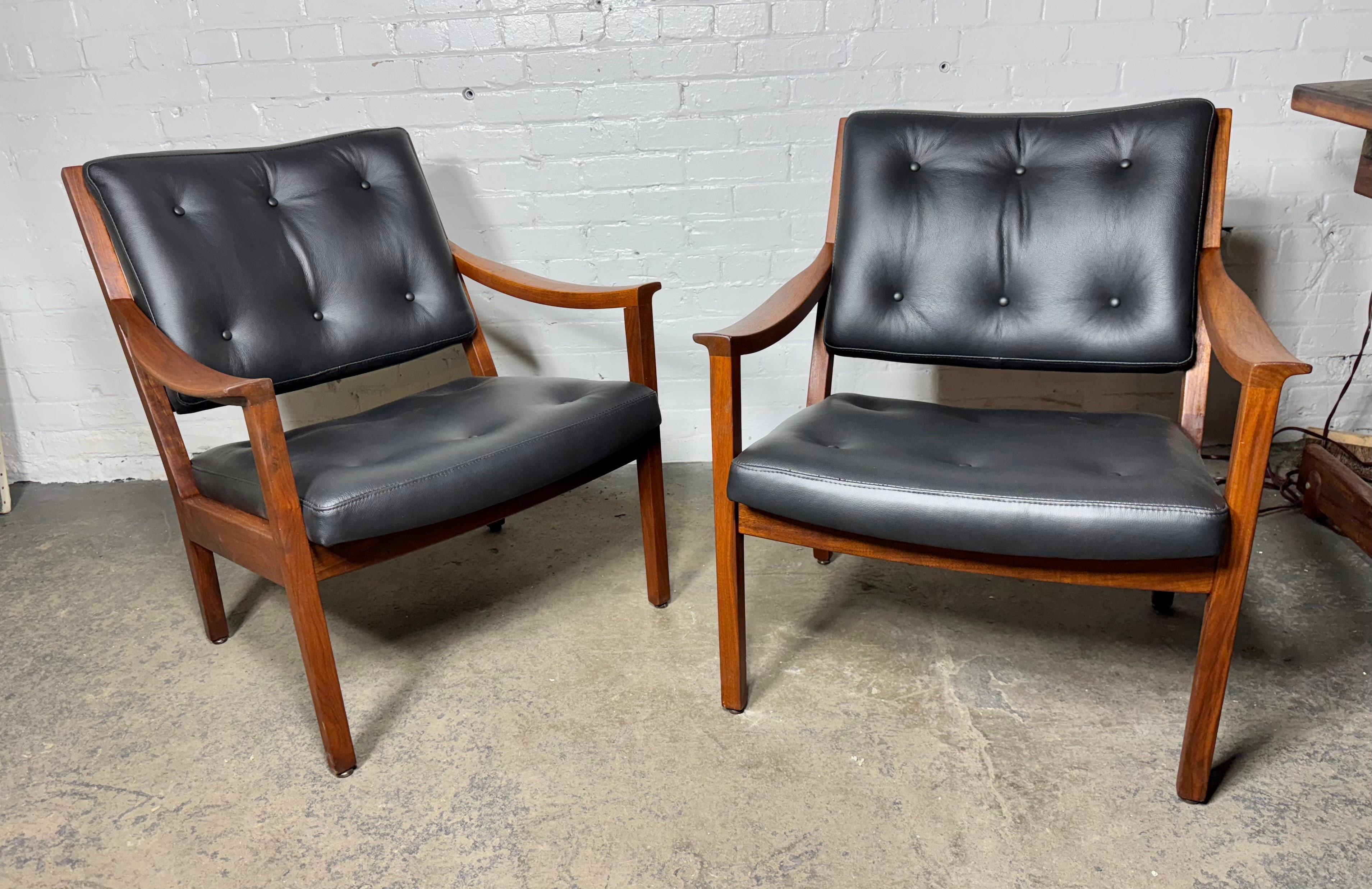 Mid-Century Modern Seldom seen pair modernist walnut and leather lounge chairs made by Gunlocke For Sale