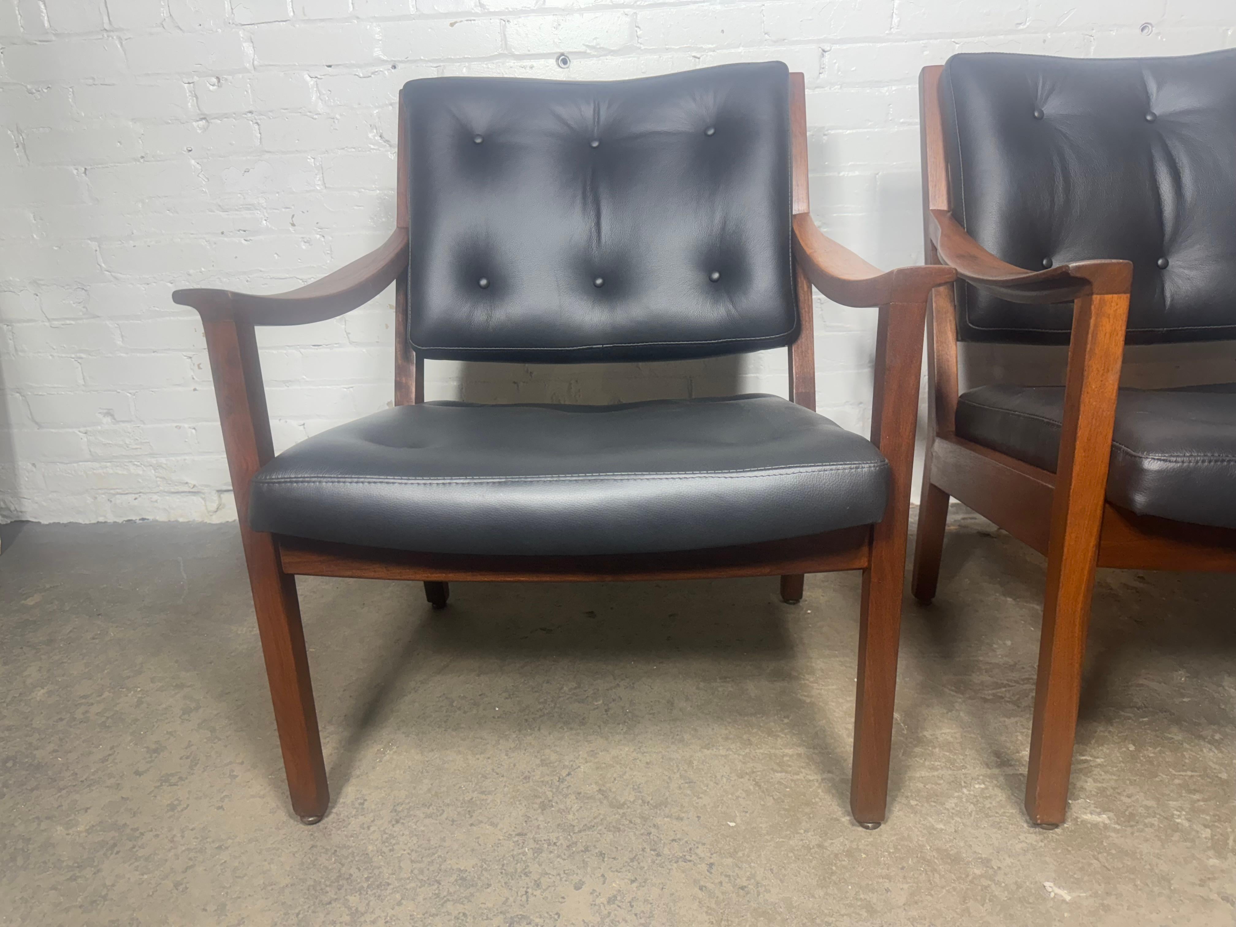 Leather Seldom seen pair modernist walnut and leather lounge chairs made by Gunlocke For Sale